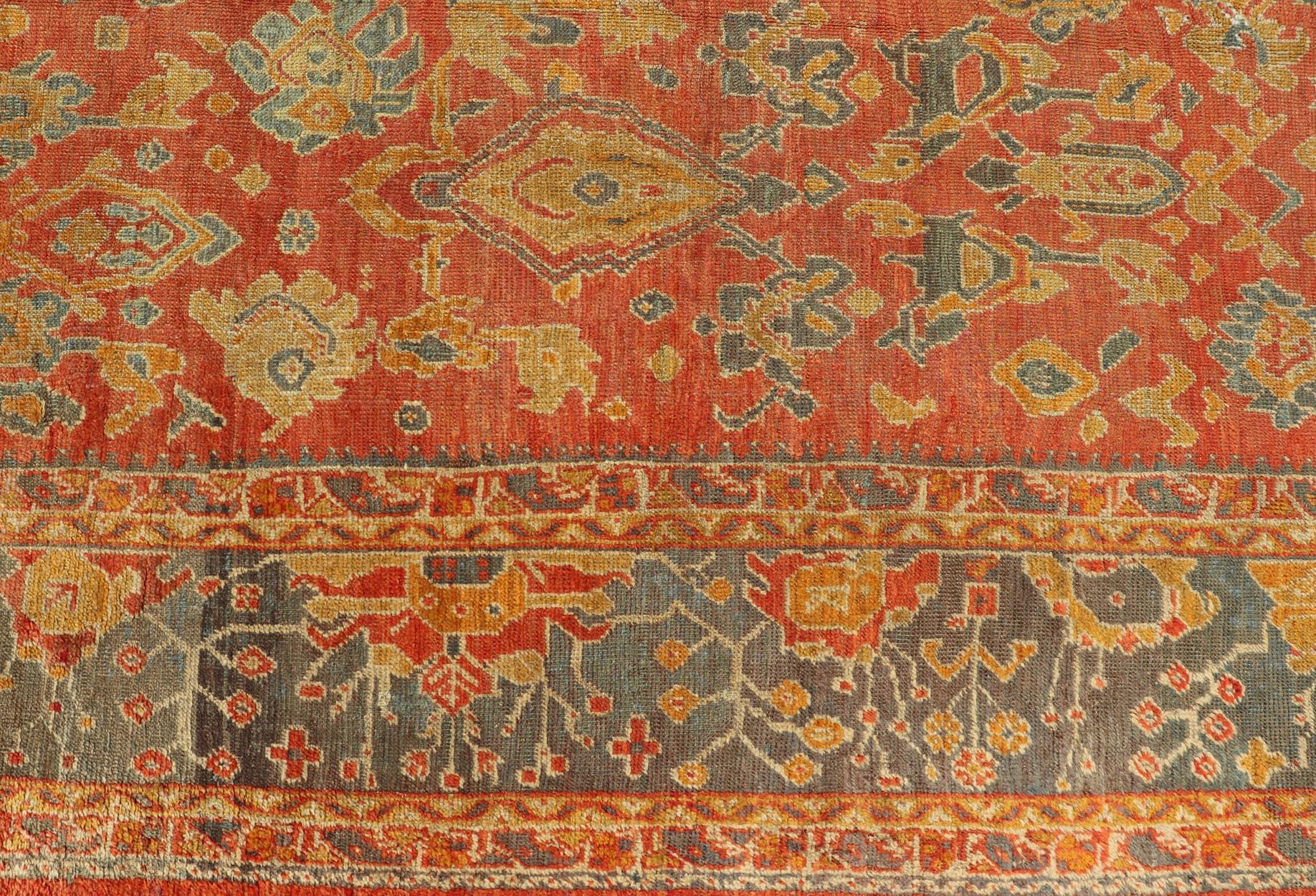 Wool Antique Turkish Oushak Rug in Terracotta With All-Over Flower, Leaves and Vines  For Sale