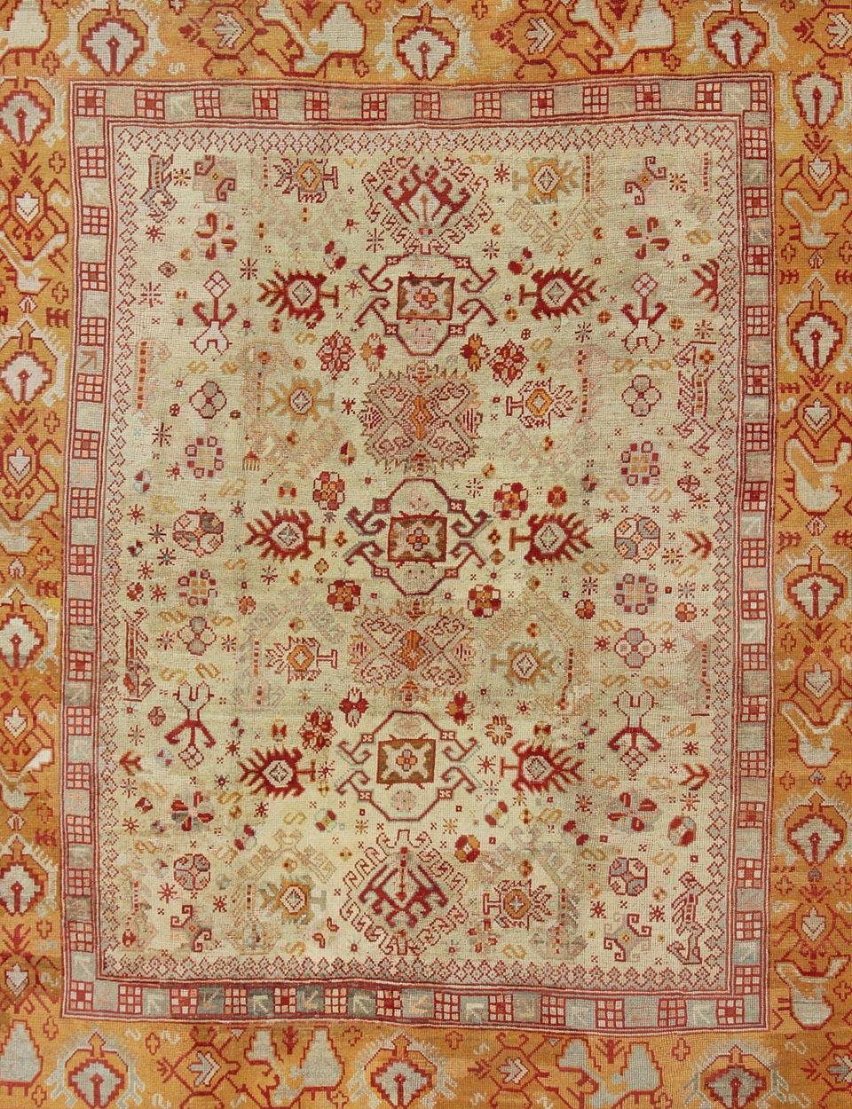 Hand-Knotted Antique Turkish Oushak Carpet With All-Over Design In Red, Taupe, and Orange For Sale