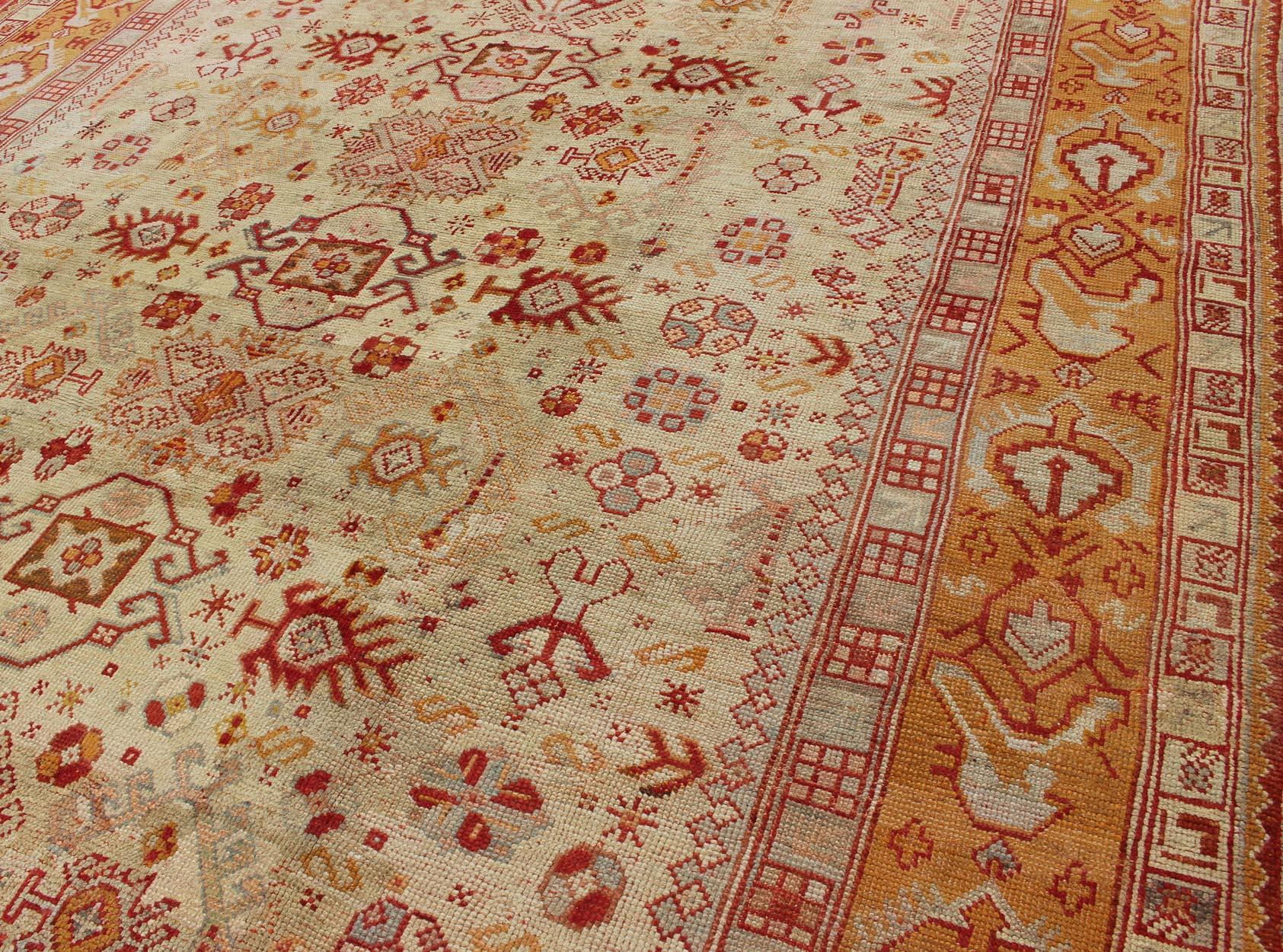 Antique Turkish Oushak Carpet With All-Over Design In Red, Taupe, and Orange For Sale 2