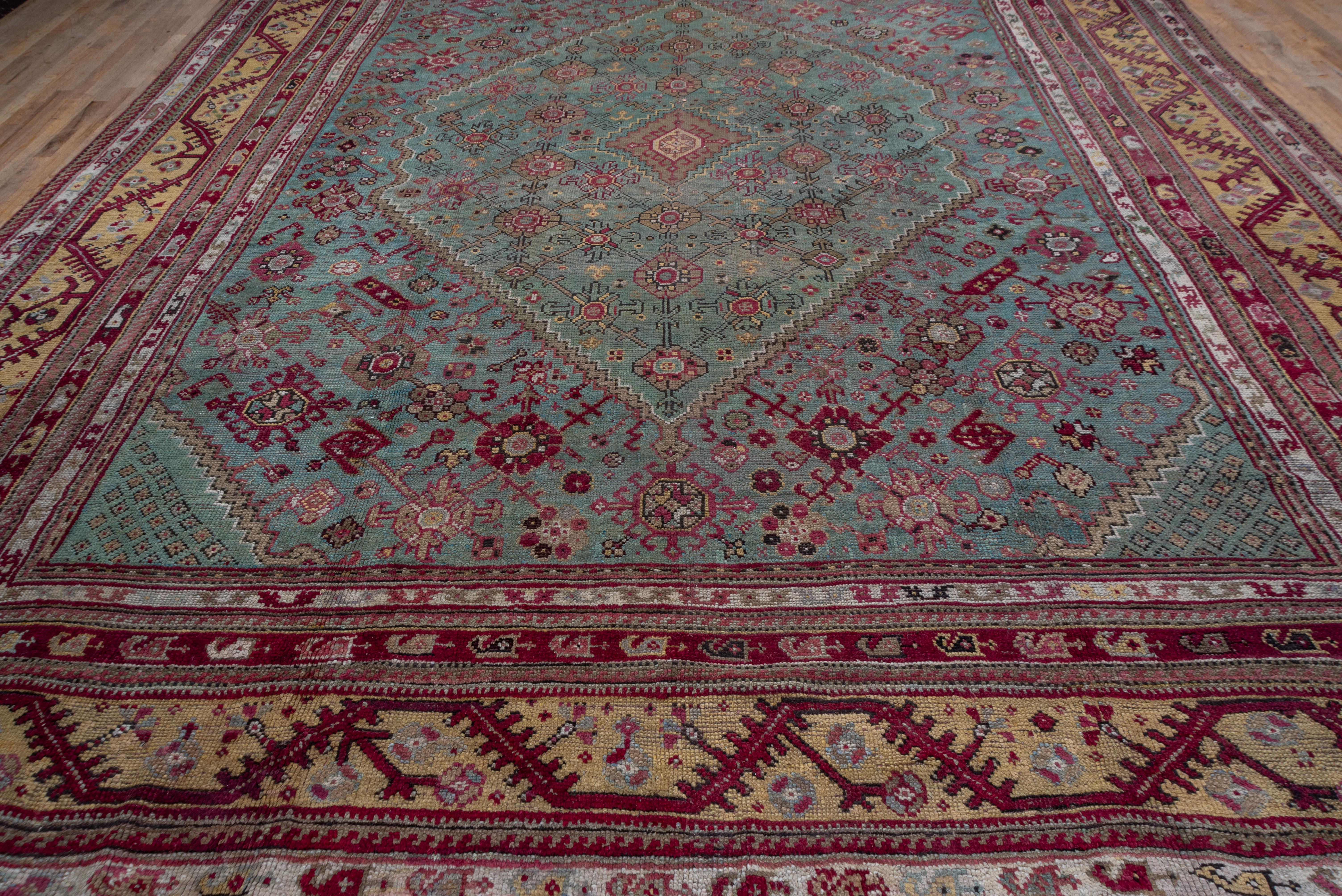 Early 20th Century Antique Turkish Oushak Carpet, Light Blue Field, Citron Border & Plum Accents For Sale