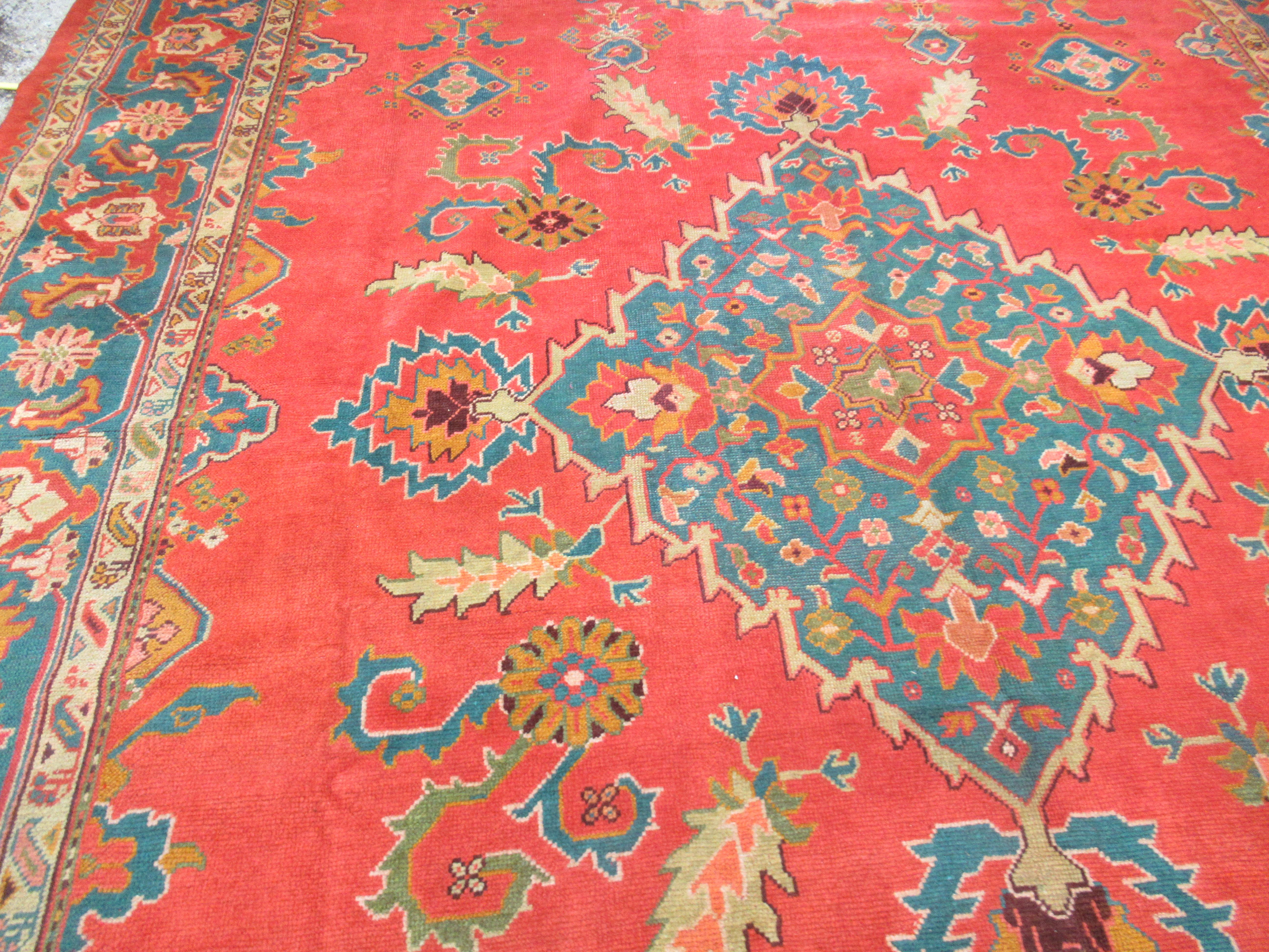 Georgian Antique Turkish Oushak Carpet of Outstanding Colour with a Small Medallion