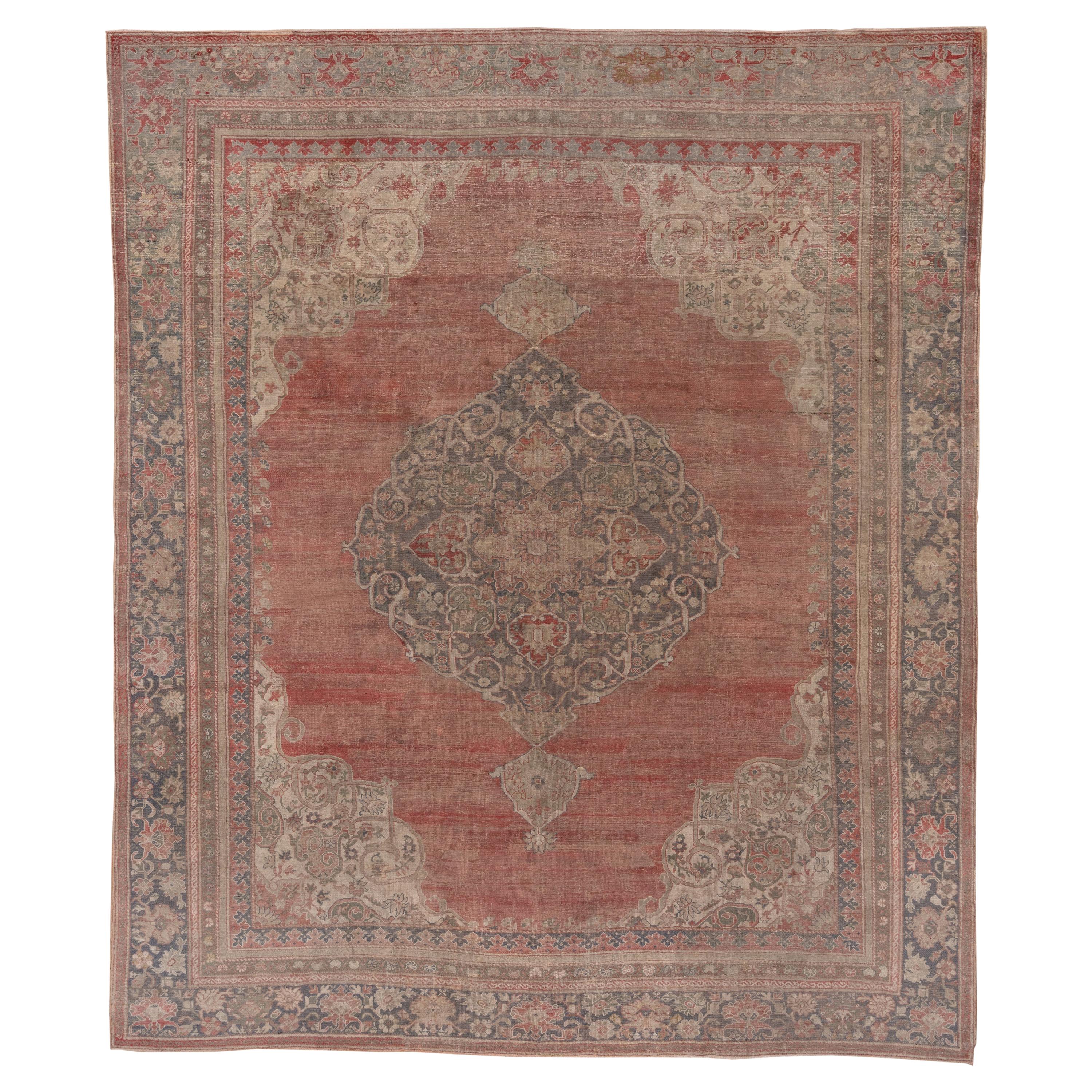 Antique Turkish Oushak Carpet, Soft Red Field, Slate Blue Borders For Sale