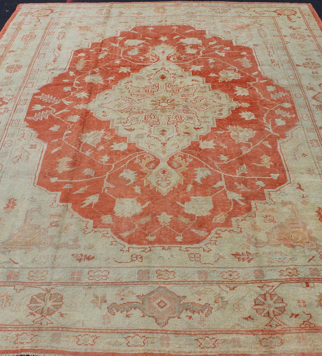 Wool Antique Turkish Oushak Carpet With Medallion In Cream and Soft Orange For Sale