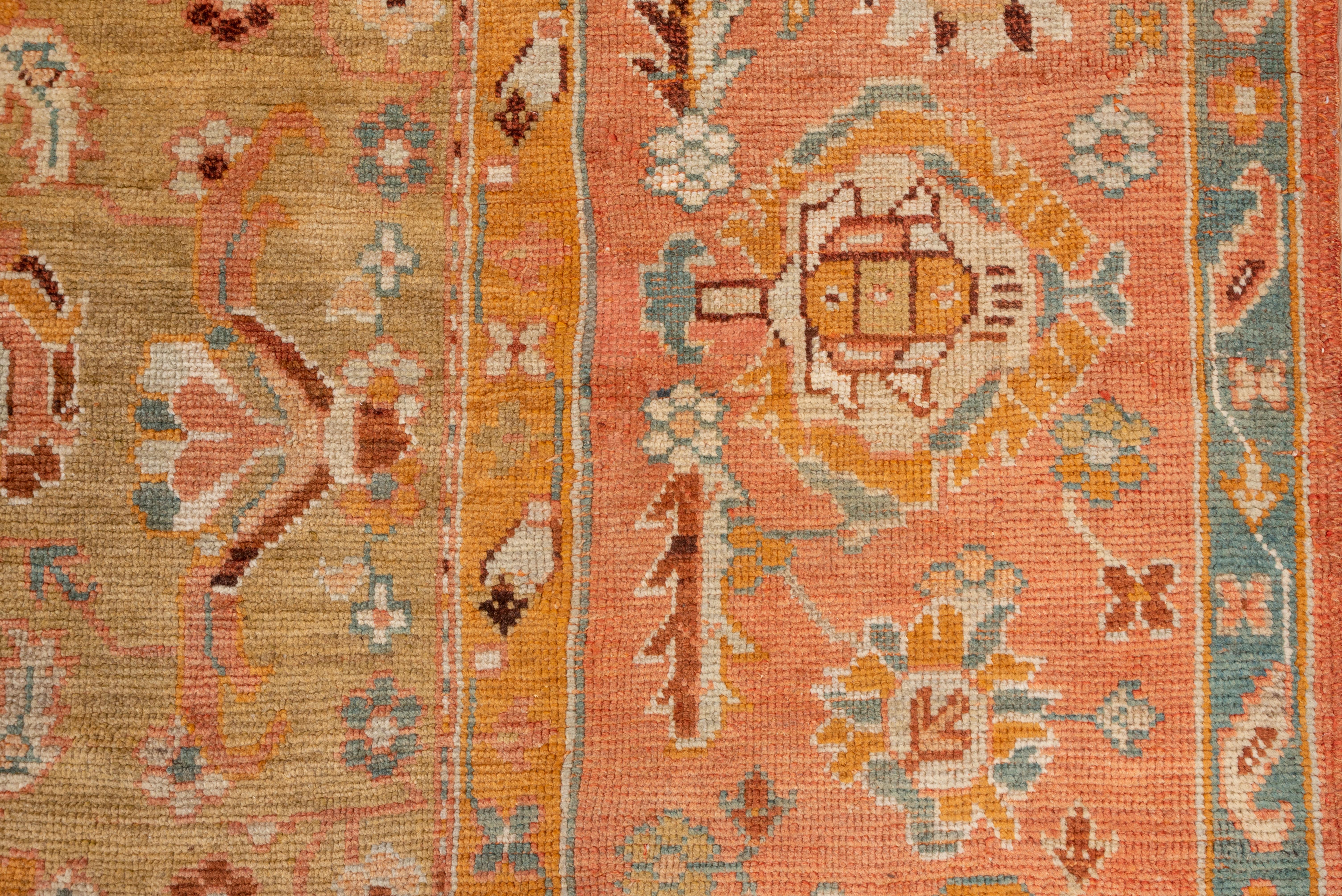 Early 20th Century Antique Turkish Oushak Carpet, Yellow Field, Pink Borders, Colorful Border For Sale