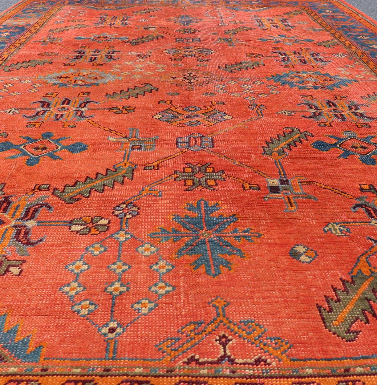 Hand-Knotted Antique Turkish Oushak Colorful Rug With All-Over Design In Salmon and Blue's  For Sale