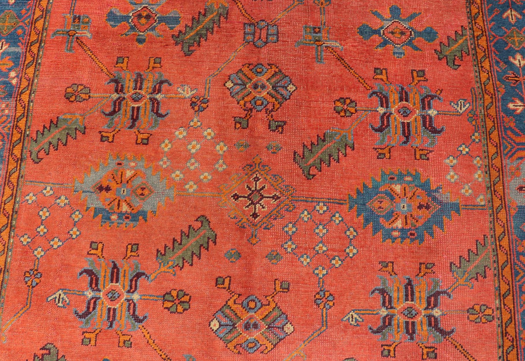 Antique Turkish Oushak Colorful Rug With All-Over Design In Salmon and Blue's  In Good Condition For Sale In Atlanta, GA