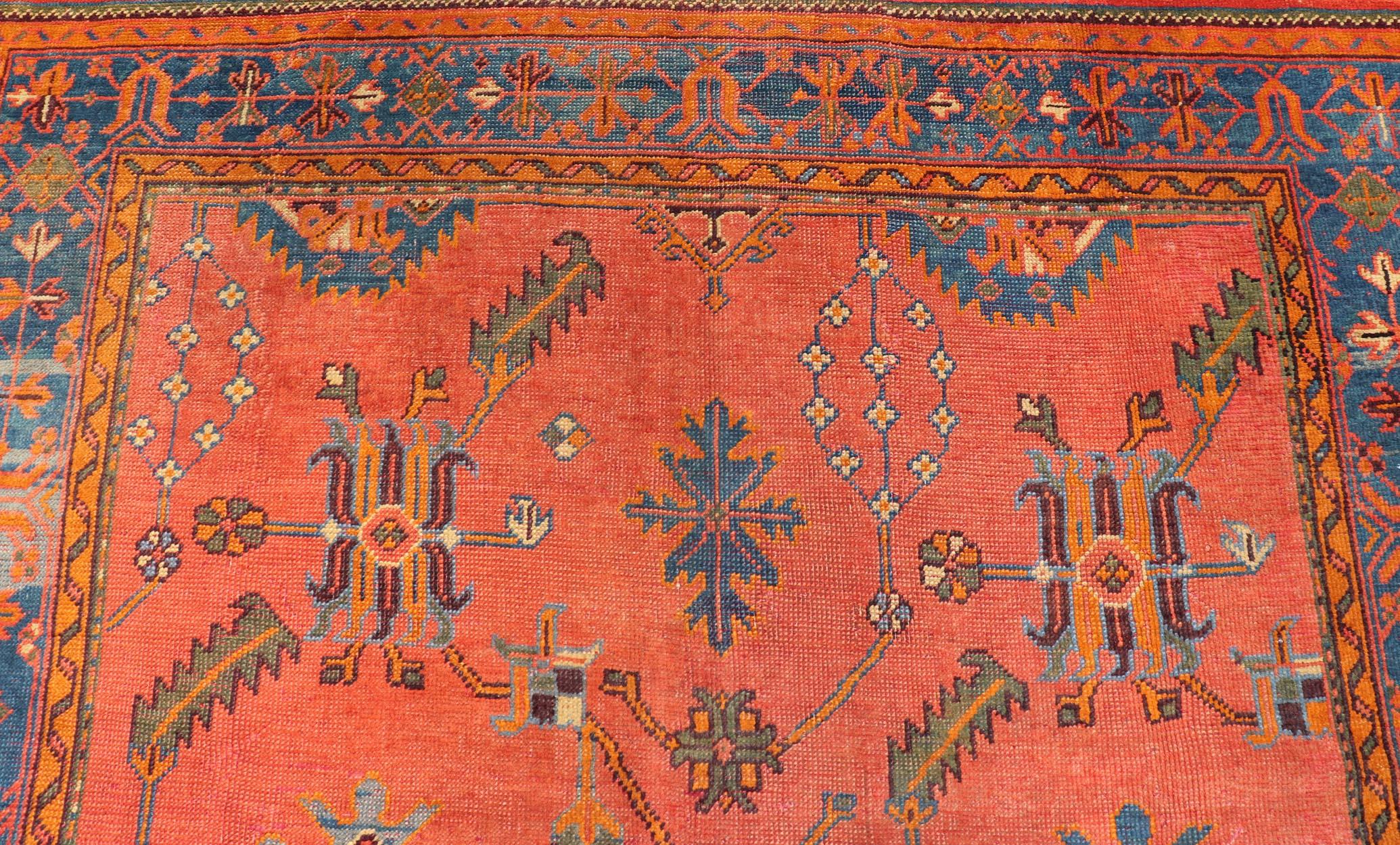 Wool Antique Turkish Oushak Colorful Rug With All-Over Design In Salmon and Blue's  For Sale