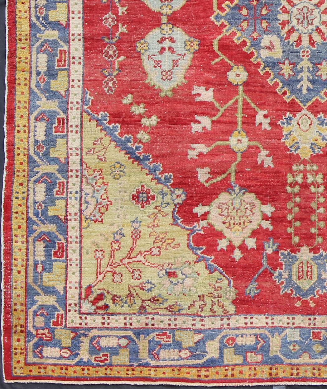 Antique Oushak in Red, Blue and light Yellow Green. Country of Origin: Turkey; Type: Oushak; Design: Medallion; Keivan Woven Arts: rug /EN-141060

Measures: 7'6'' x 9'6''

This antique Oushak rug displays denim blue as the prominent border with