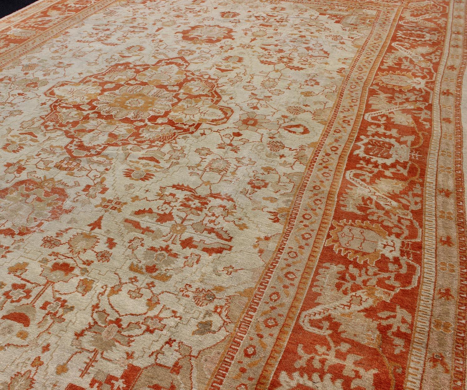 Antique Turkish Floral Oushak Rug in Cream,  Rust Red, Orange and Green   For Sale 6