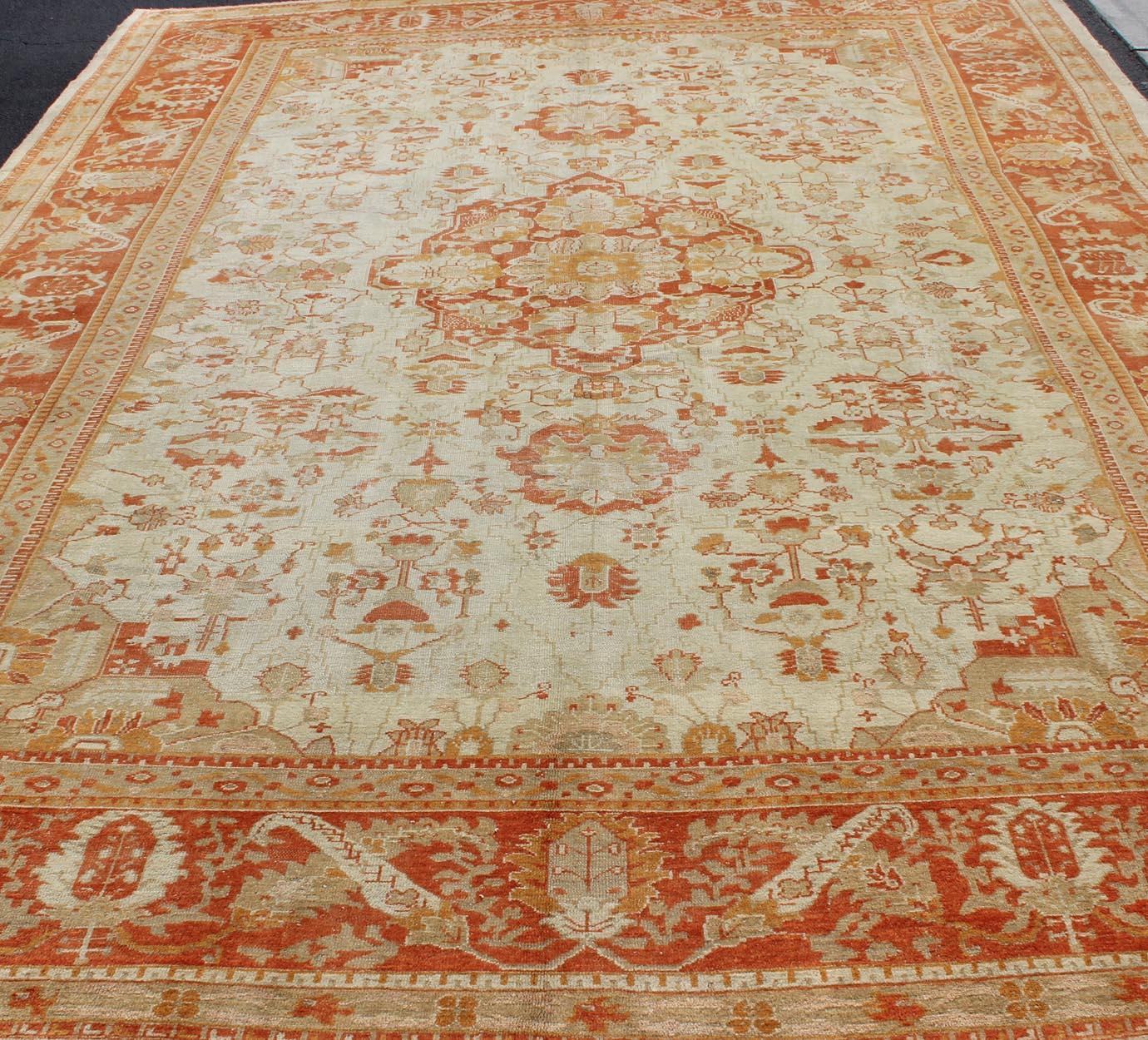 Antique Turkish Floral Oushak Rug in Cream,  Rust Red, Orange and Green   For Sale 7