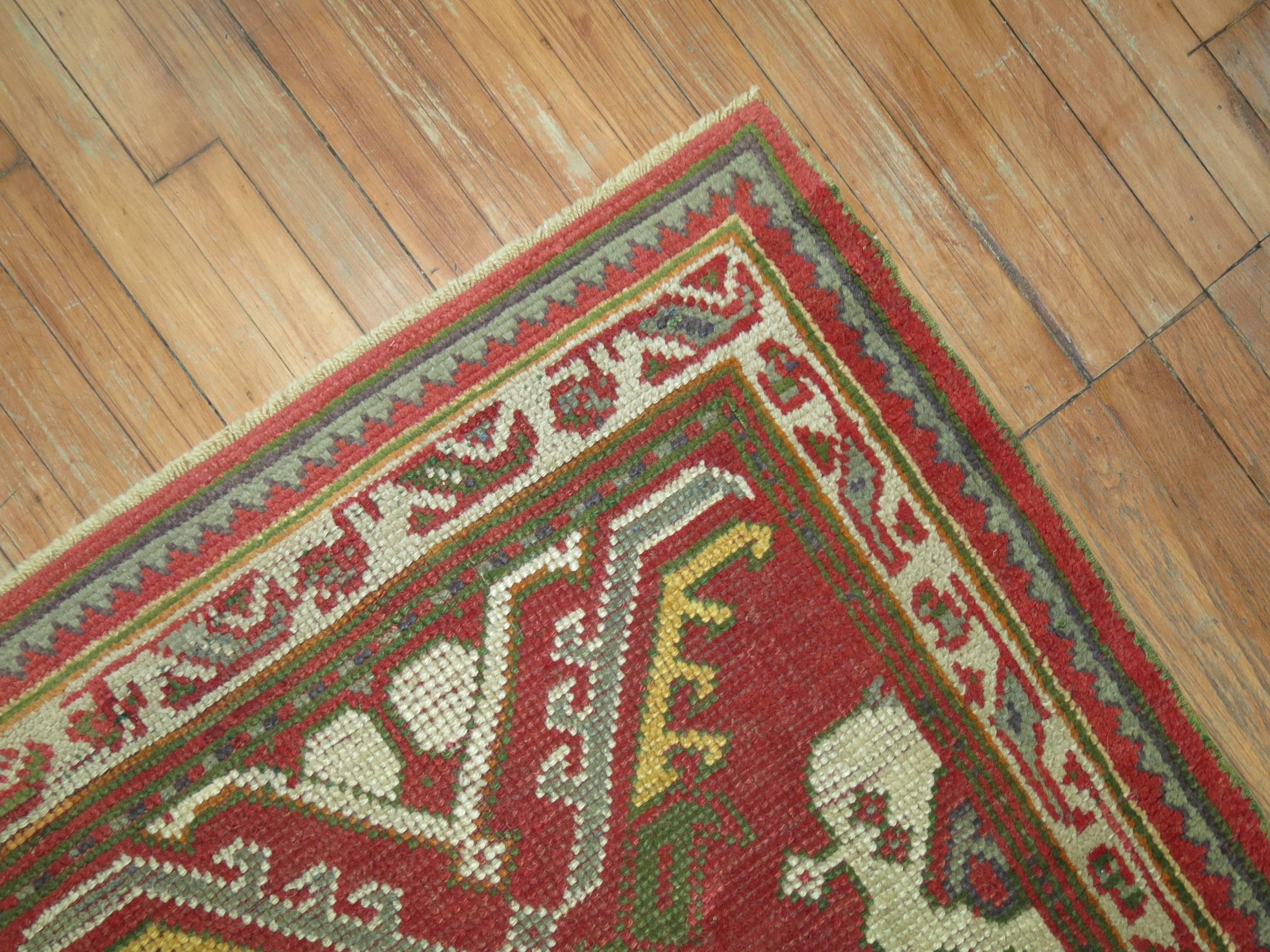 A colorful small runner size antique Turkish Oushak from the early stages of the 20th century.

Measures: 3'2'' x 6'.