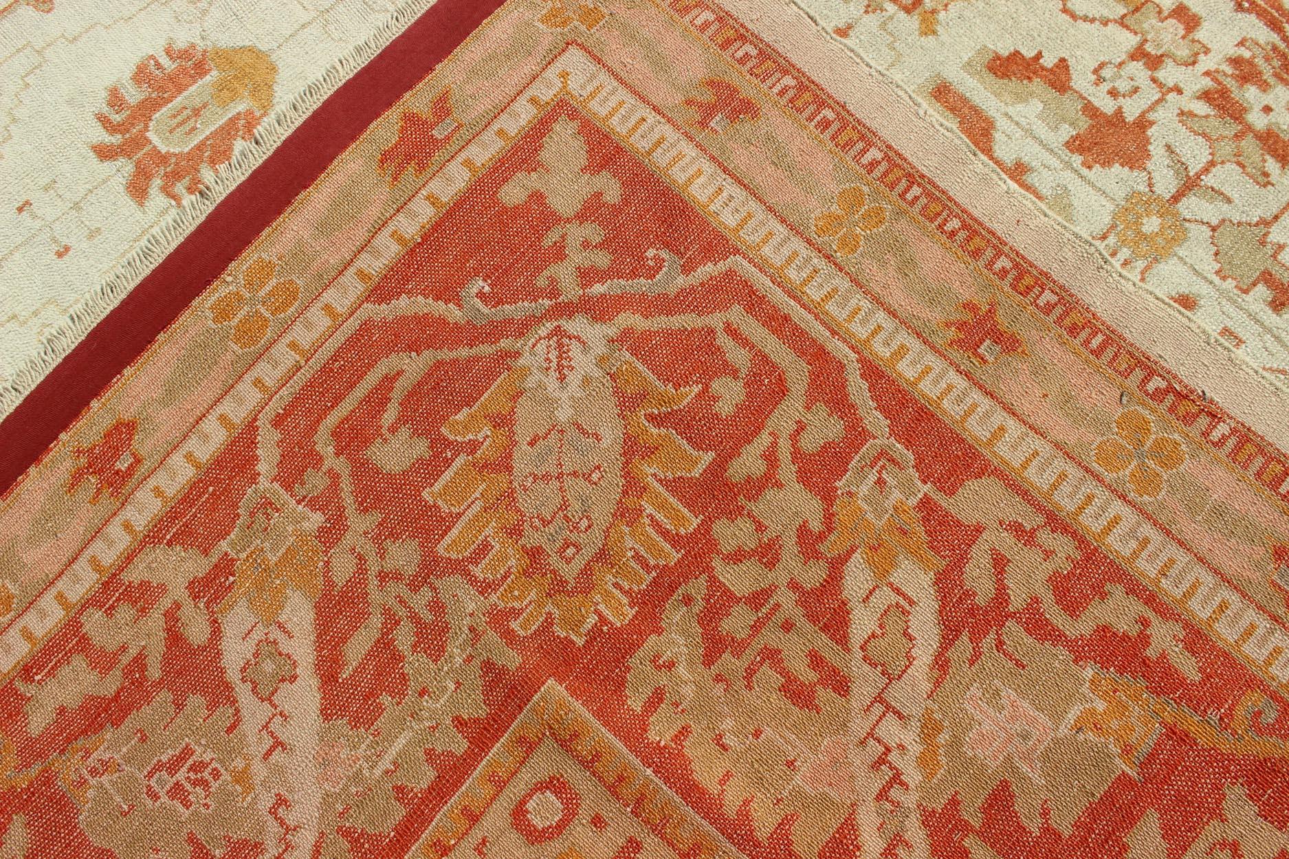 Early 20th Century Antique Turkish Floral Oushak Rug in Cream,  Rust Red, Orange and Green   For Sale