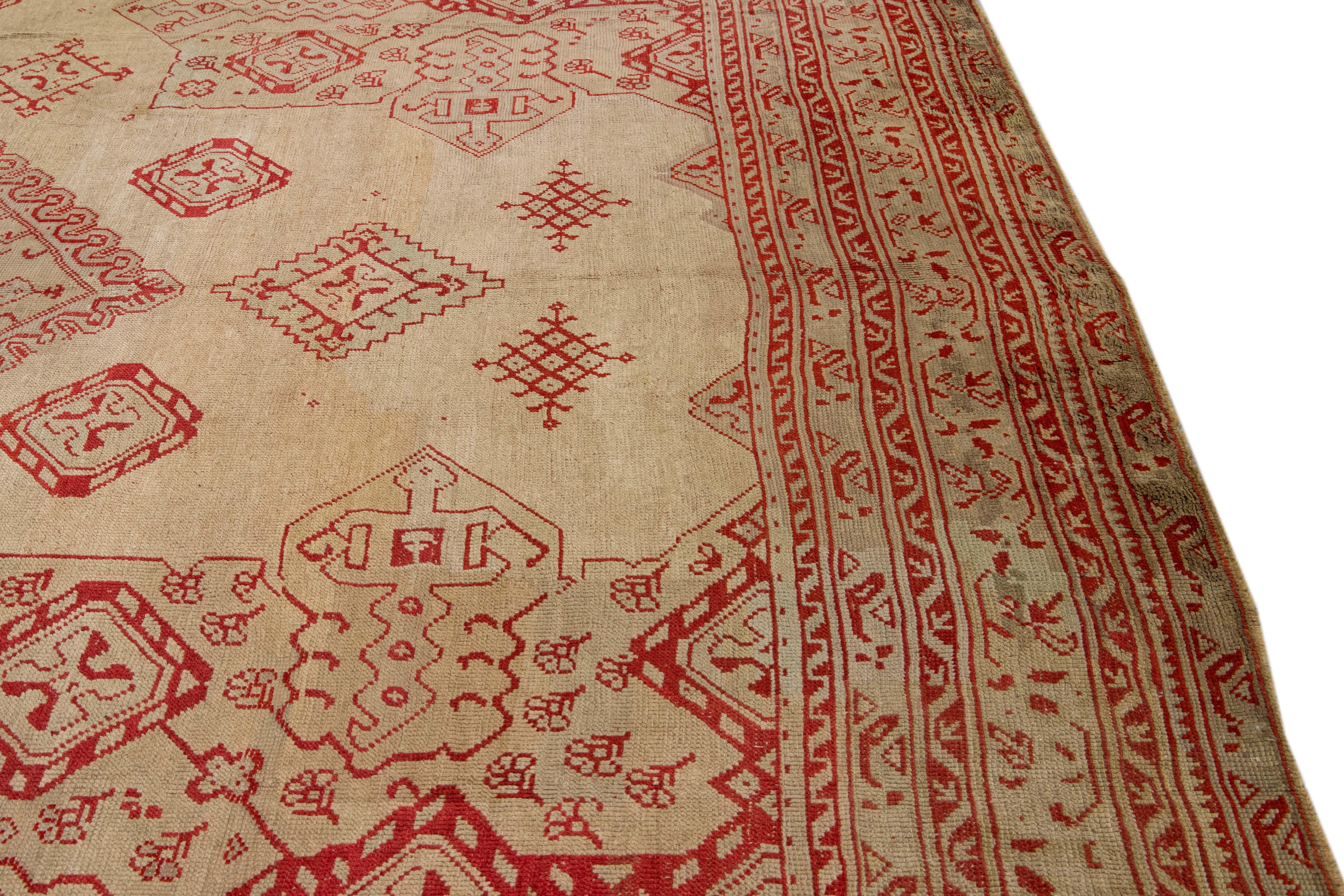 Antiker türkischer handgefertigter, brauner und roter Oversize-Wollteppich in Medaillon-Design, Oushak im Angebot 2