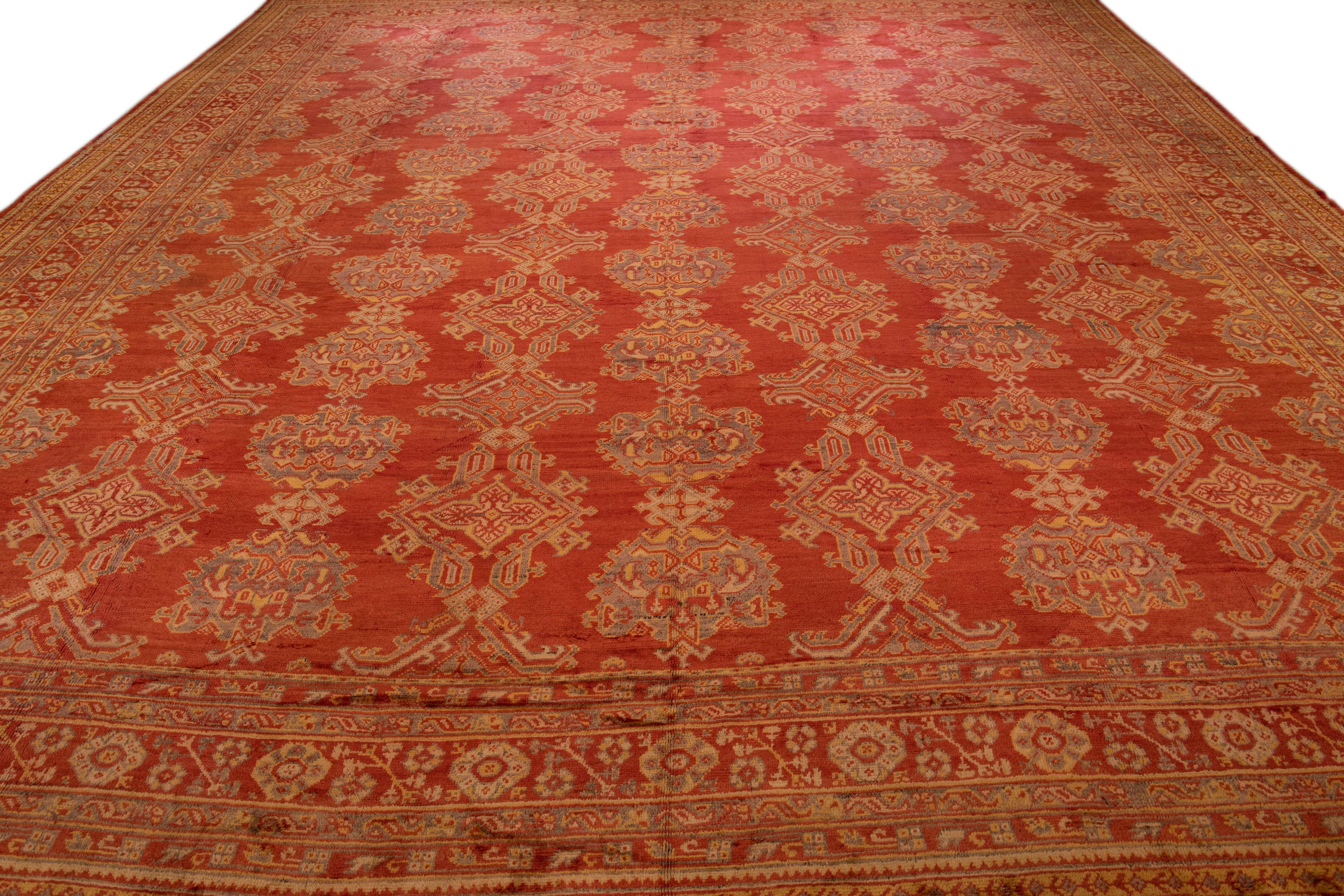 Hand-Knotted Antique Turkish Oushak Handmade Orange-Rust Wool Rug with Geometric Pattern For Sale
