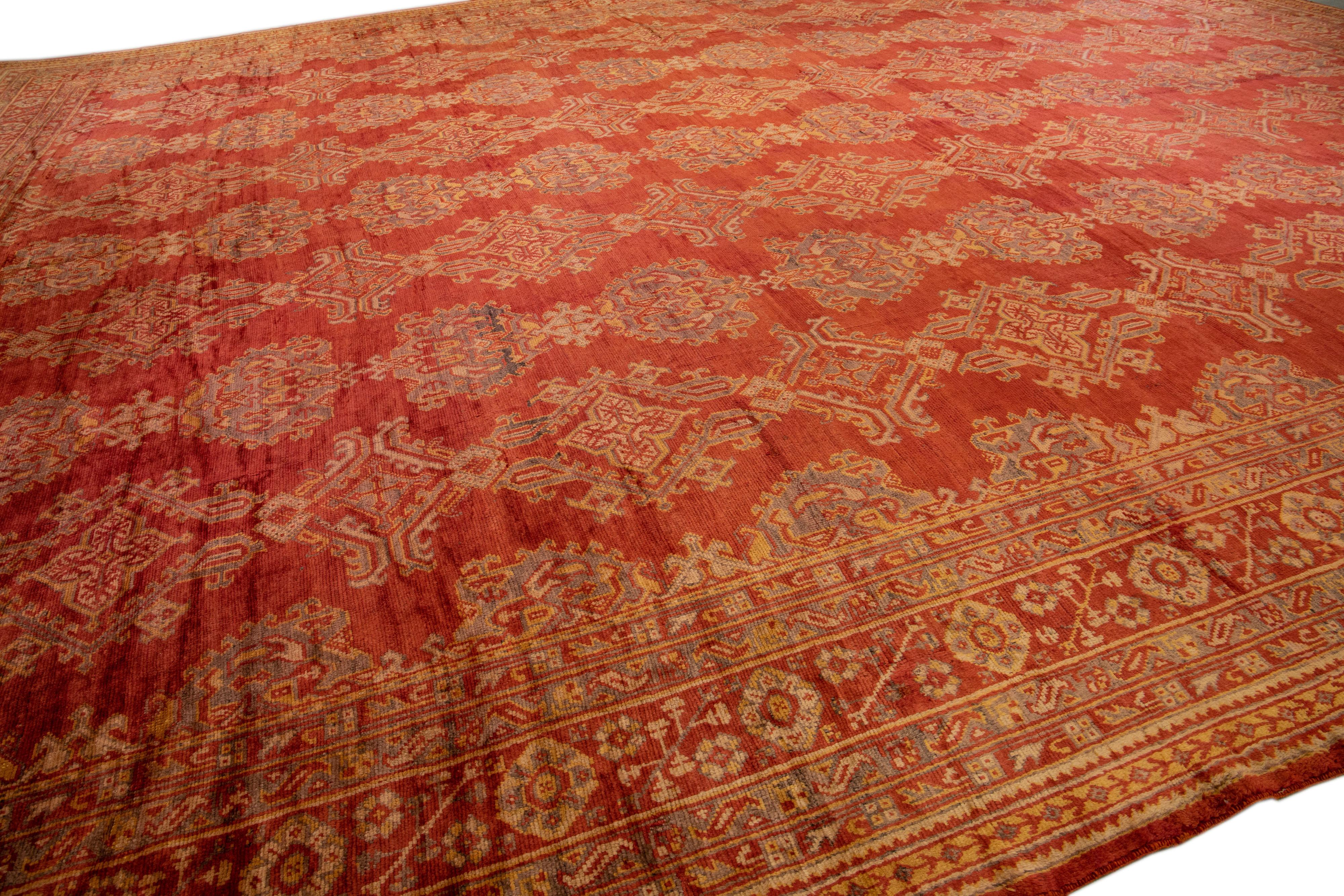 19th Century Antique Turkish Oushak Handmade Orange-Rust Wool Rug with Geometric Pattern For Sale