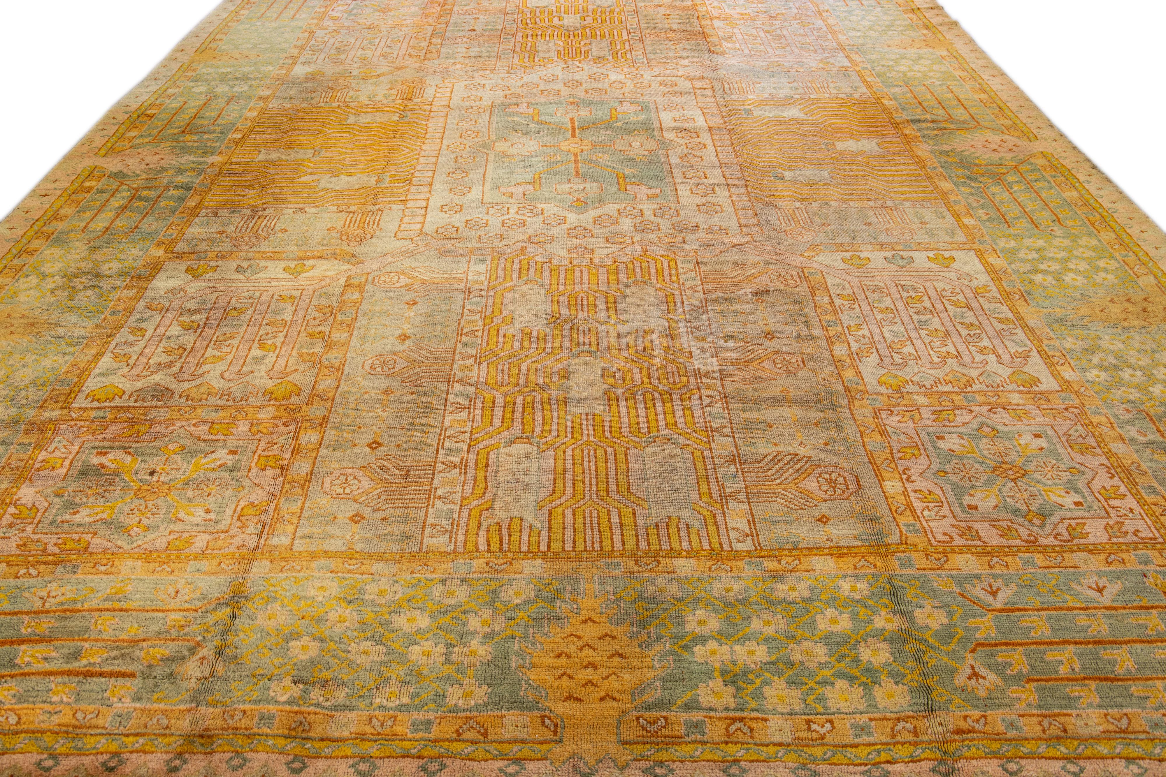 Hand-Knotted Antique Turkish Oushak Handmade Tan Wool Rug with Allover Designed For Sale