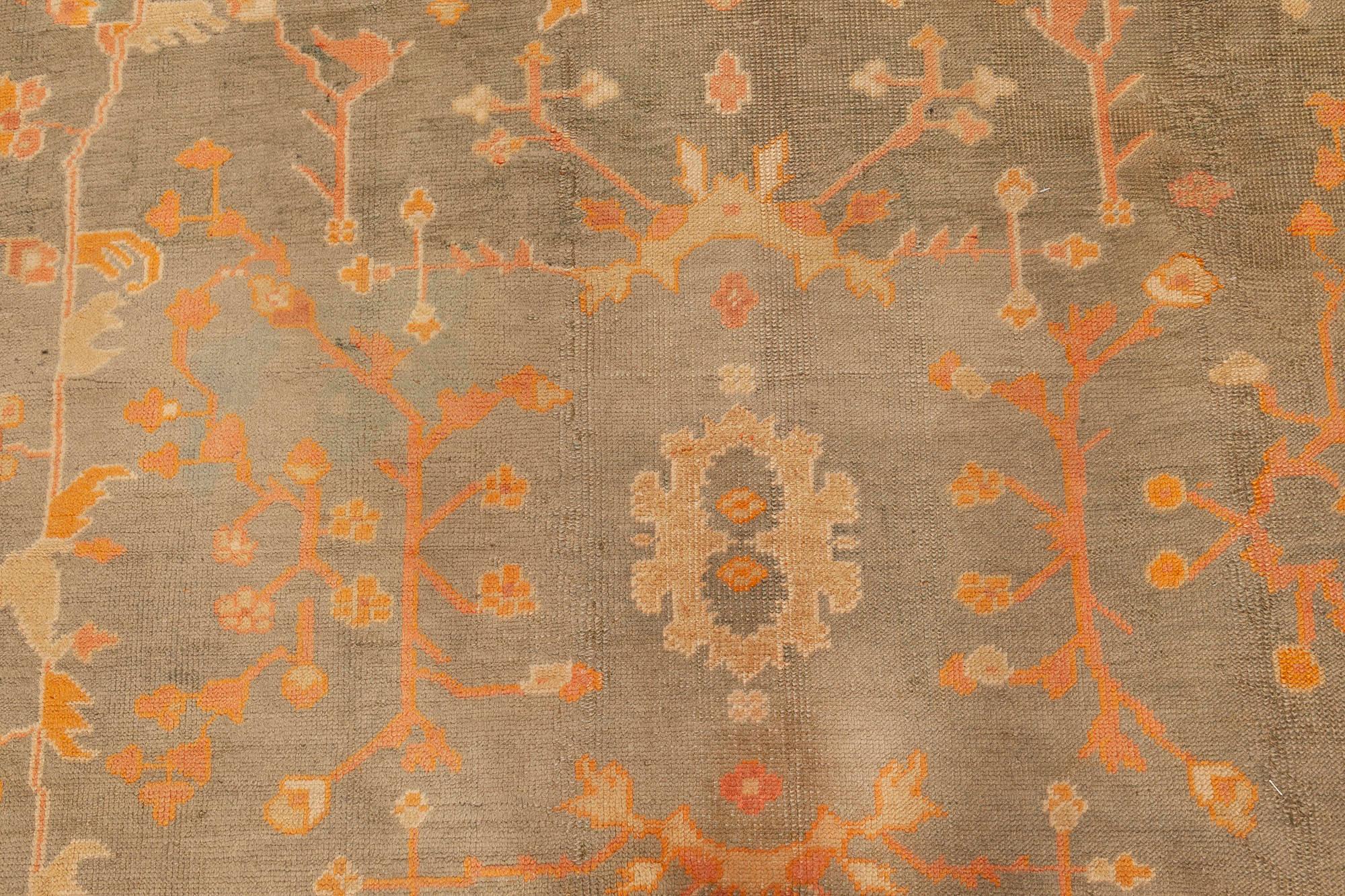 Antique Turkish Oushak beige, gold, green, orange wool rug
Size: 10'6