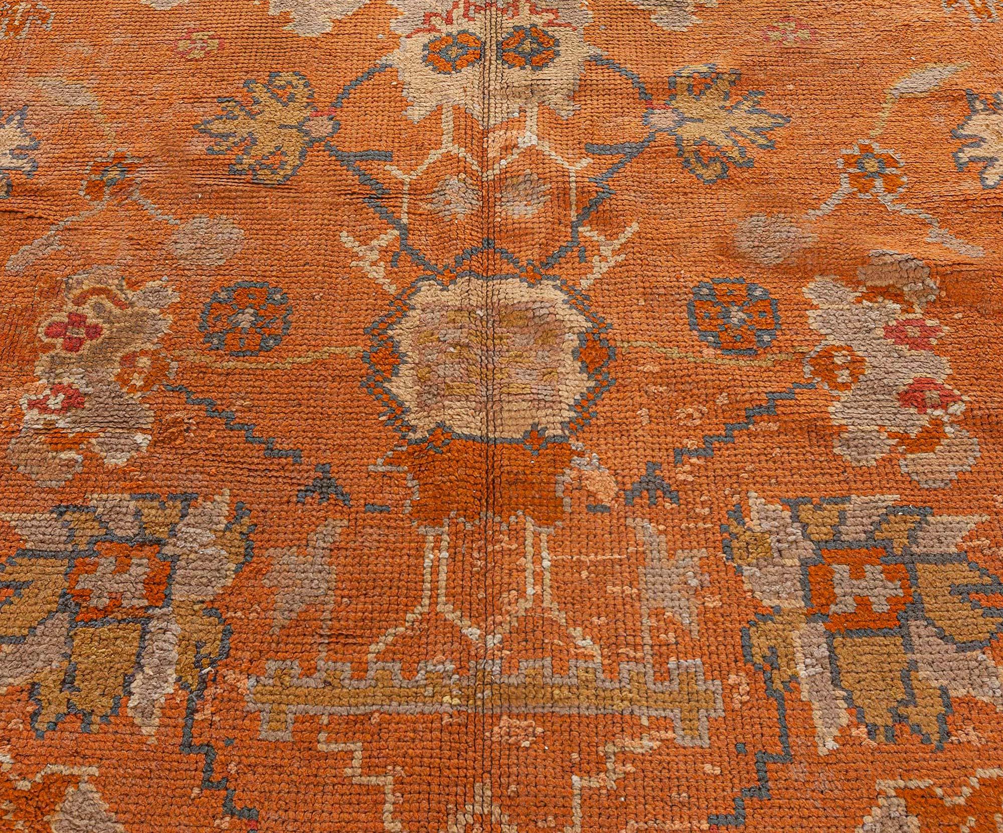 Antique Turkish Oushak Rug
Size: 12'0