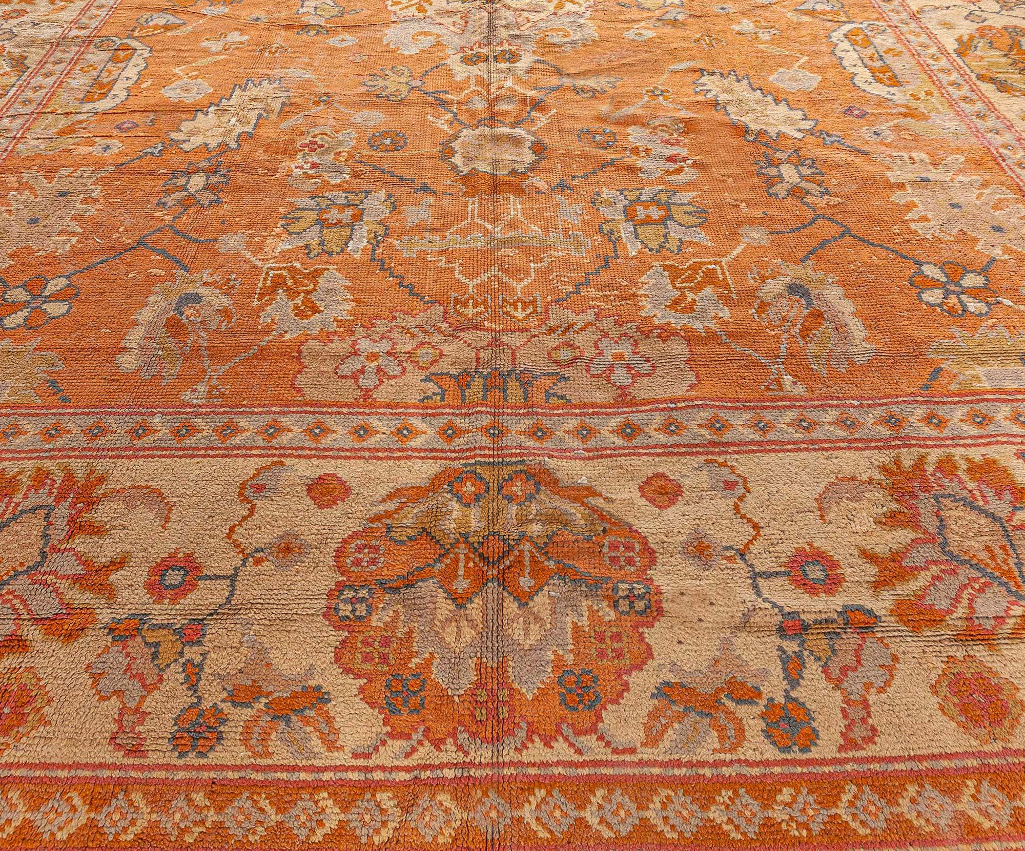 Hand-Knotted Antique Turkish Oushak Handwoven Wool Rug For Sale