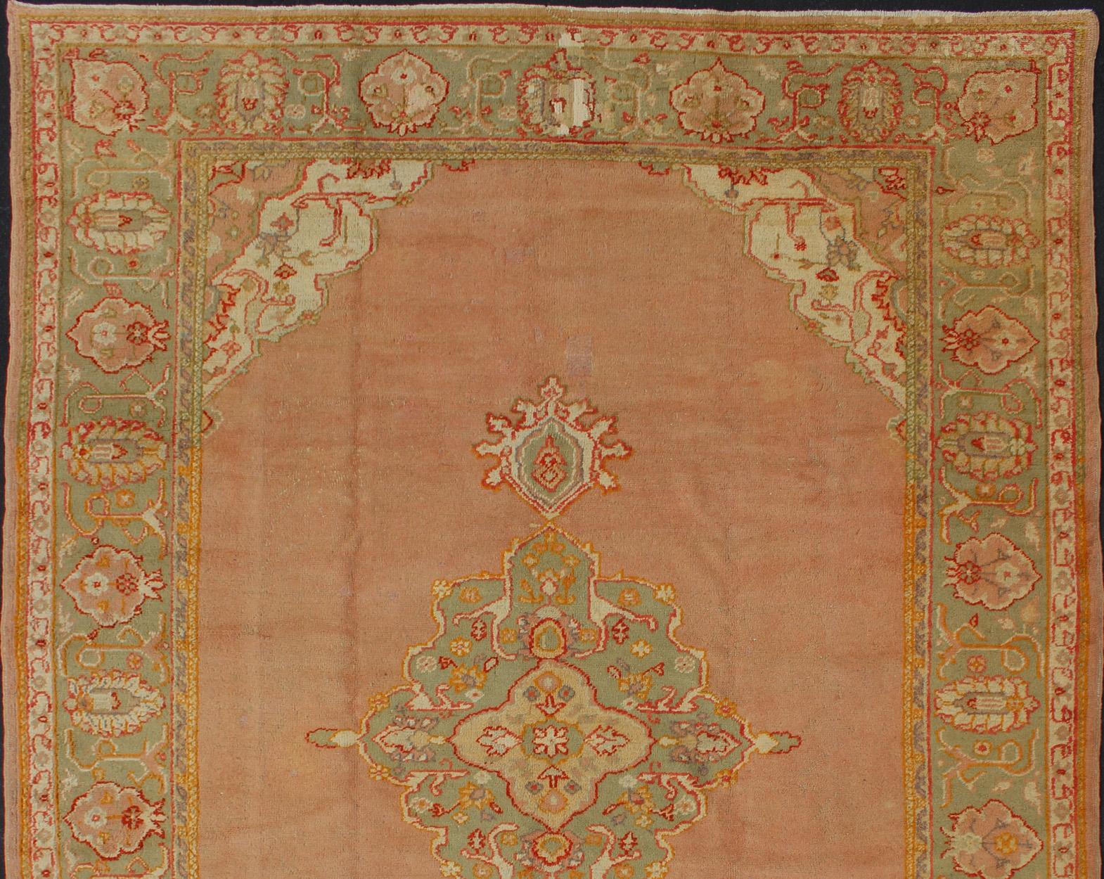 Antique Turkish Oushak in Pink Background and Light Green Border For Sale 8