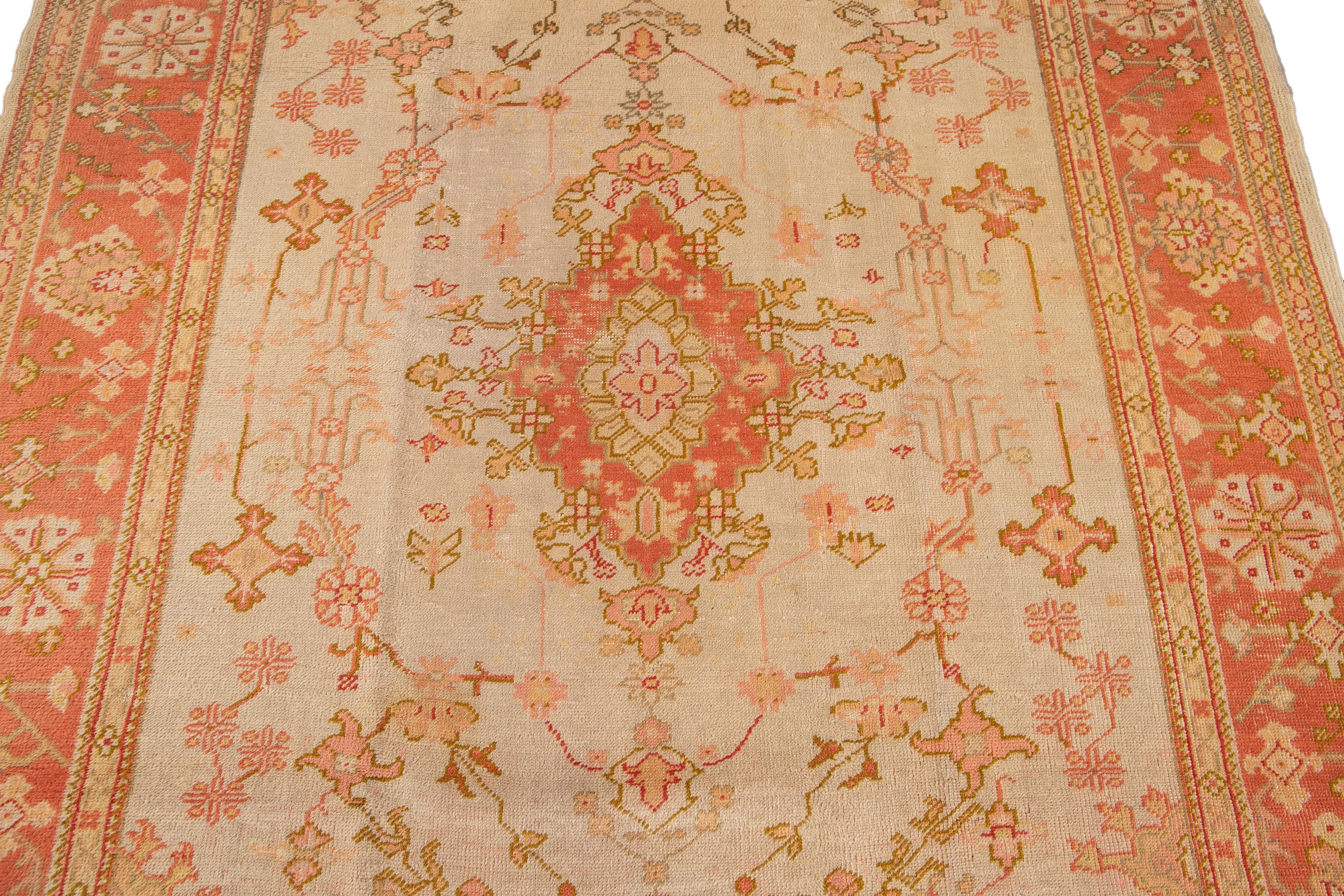 Hand-Knotted Antique Turkish Oushak Peach Handmade Medallion Motif Wool Rug For Sale