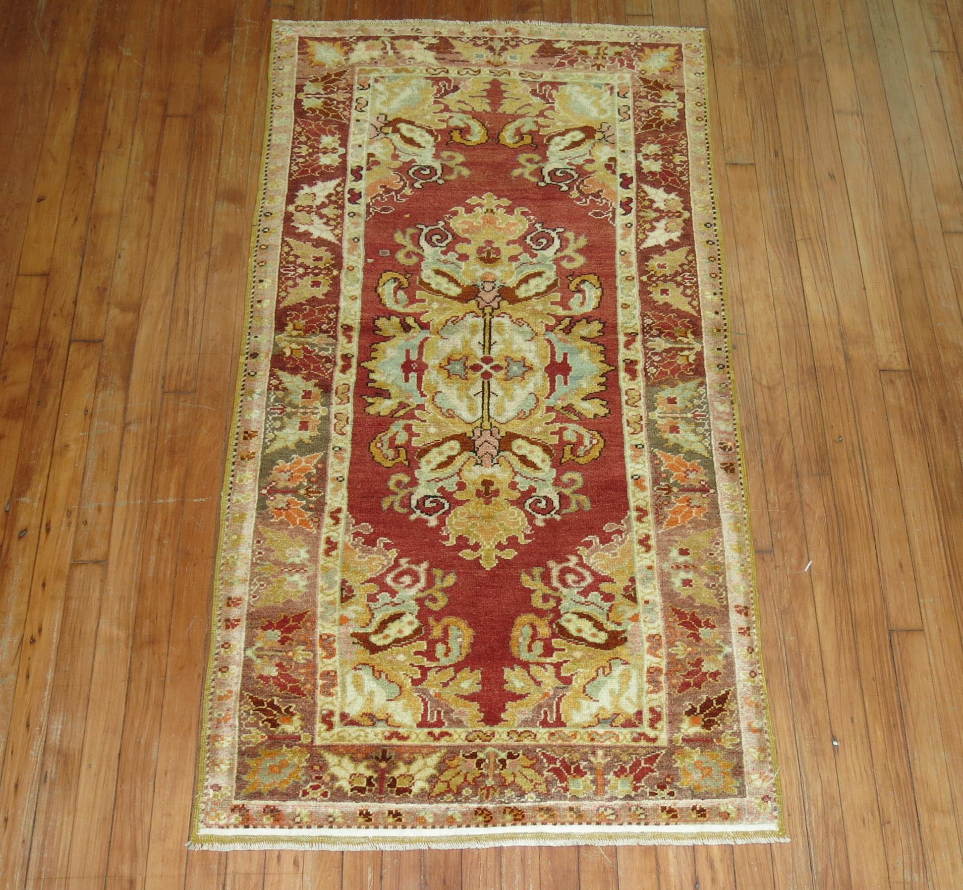 A scatter-size antique Turkish Oushak rug, circa second quarter of the 20th century.

2'10'' x 5'6''