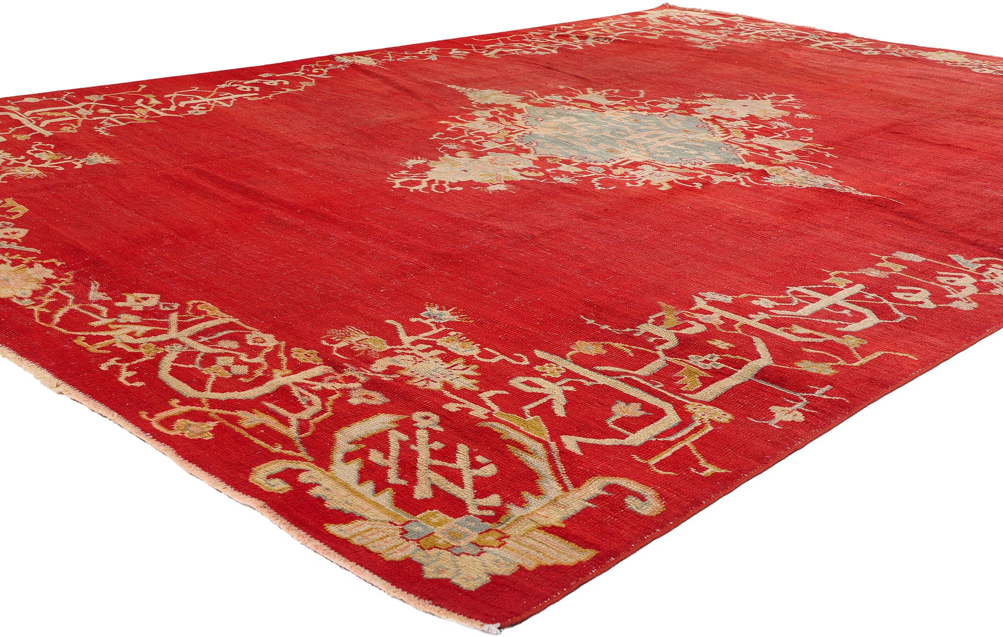 73422 Antique Turkish Oushak Rug, 08’05 x 11’10. This exquisite hand-knotted wool antique Turkish Oushak rug is a splendid example of traditional craftsmanship combined with regal aesthetics. Its striking crimson field is adorned with an elaborate