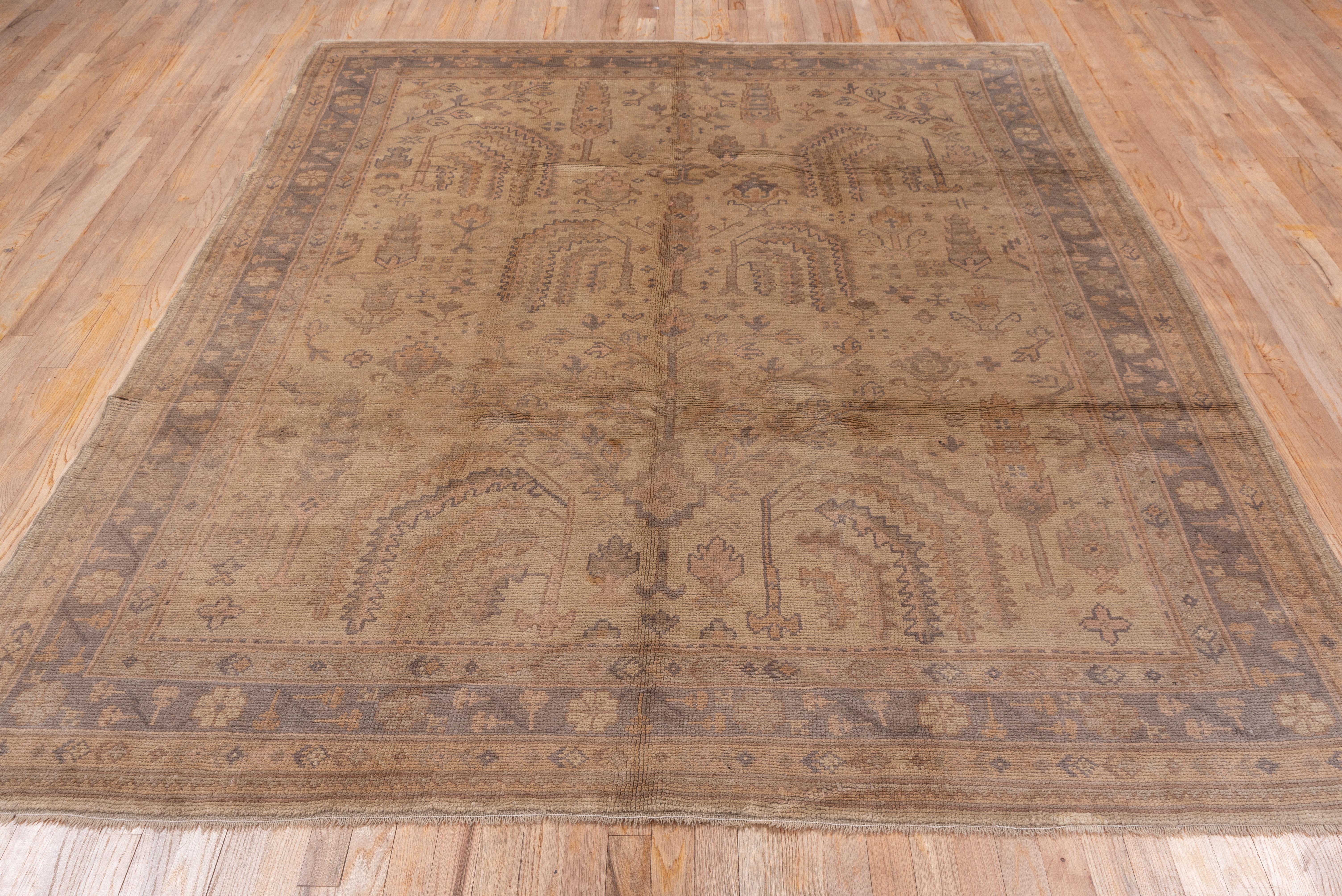 Antique Turkish Oushak rugs, are a type of handmade textile originating from the Oushak region in Western Anatolia, Turkey. These rugs have a rich history dating back to the 15th century and are known for their distinctive designs, colors, and