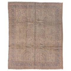 Tappeto antico turco Oushak, campo beige, bordi pervinca, accenti rosa chiaro