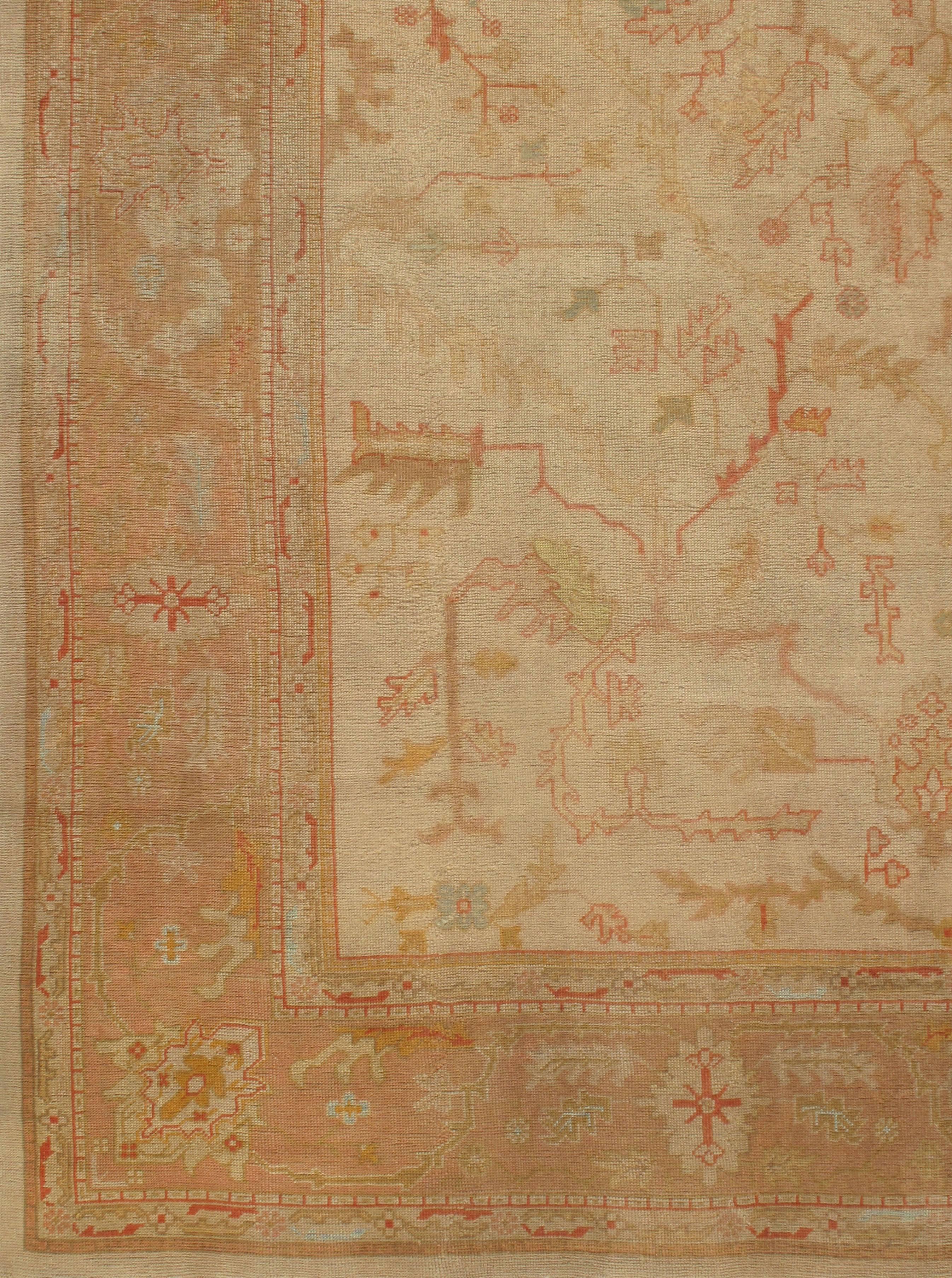 Antique Turkish Oushak rug, circa 1890, 11'6 x 14'6. Antique Oushaks are known for their soft palettes combined with eccentric drawing. The relatively coarse weaves, here on a wool foundation, mean vinery and branches are bent and broken rather than