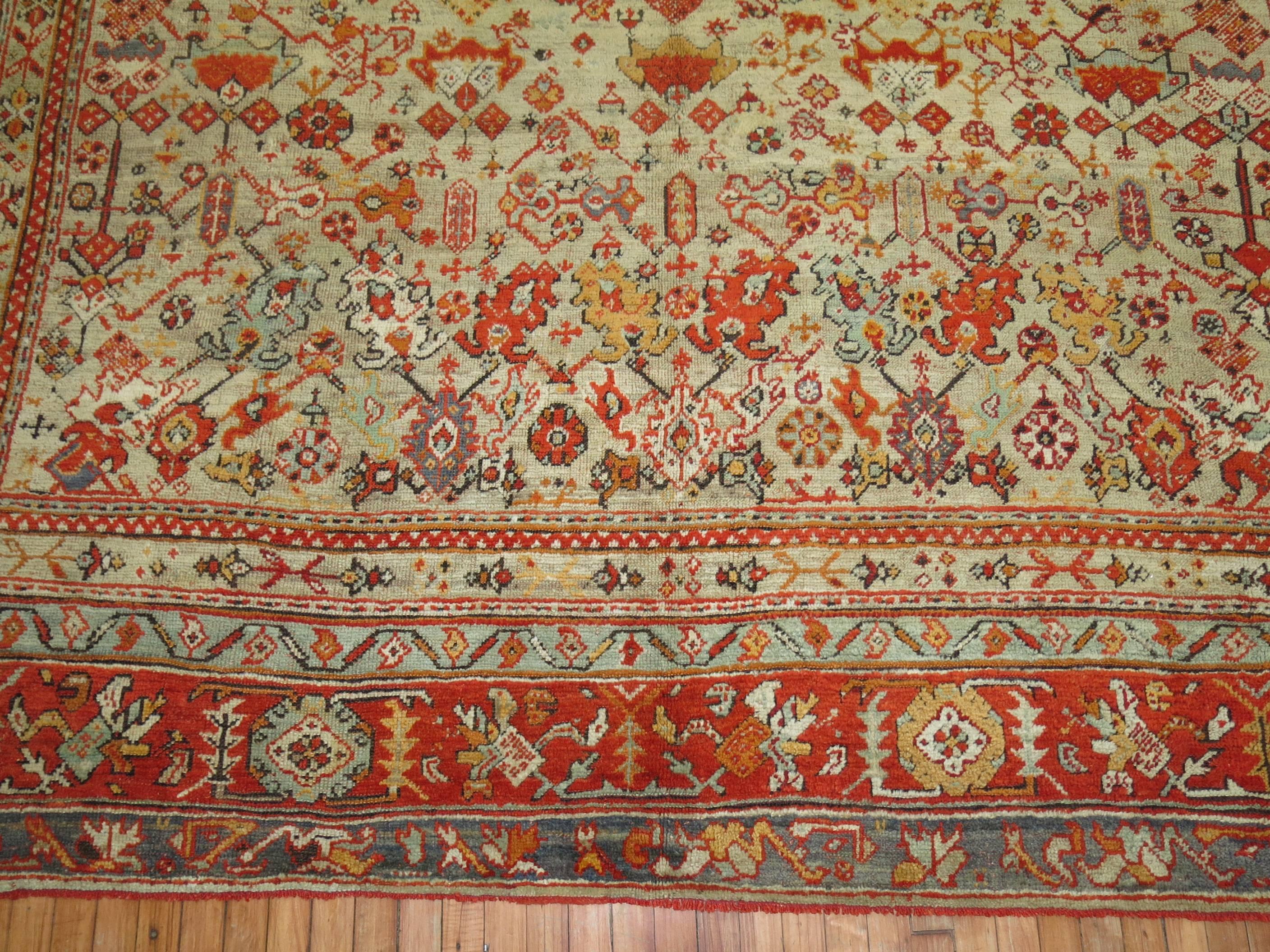 An early 20th century square size antique Turkish Oushak featuring an-all over design in warm colors.

11' x 11'8''
