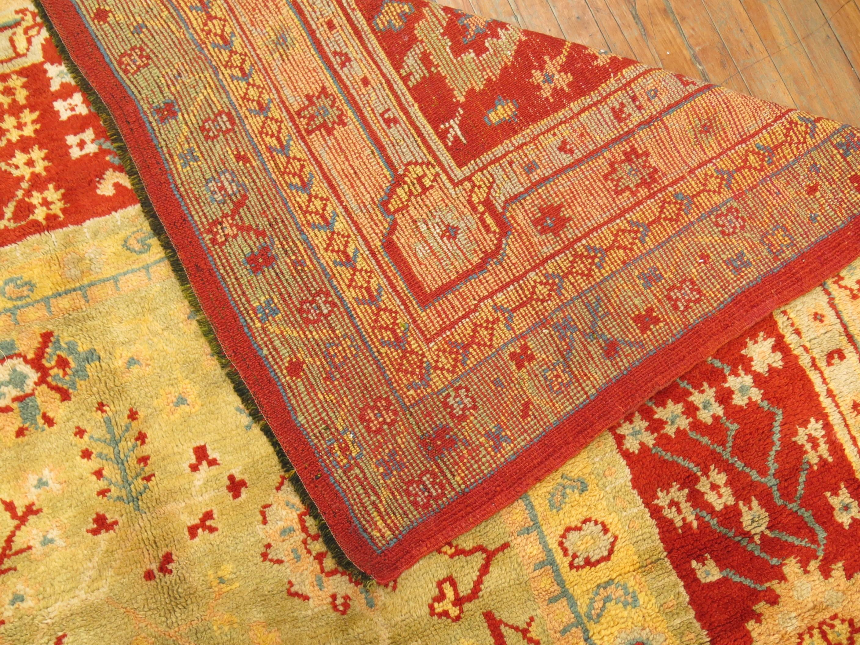 An early 20th century colorful palace size full pile condition antique Turkish Oushak rug.
The texture and full pile condition on this rug is un-parallel. Absolutely no issues with the rug as previous owner kept it in a well preserved state for