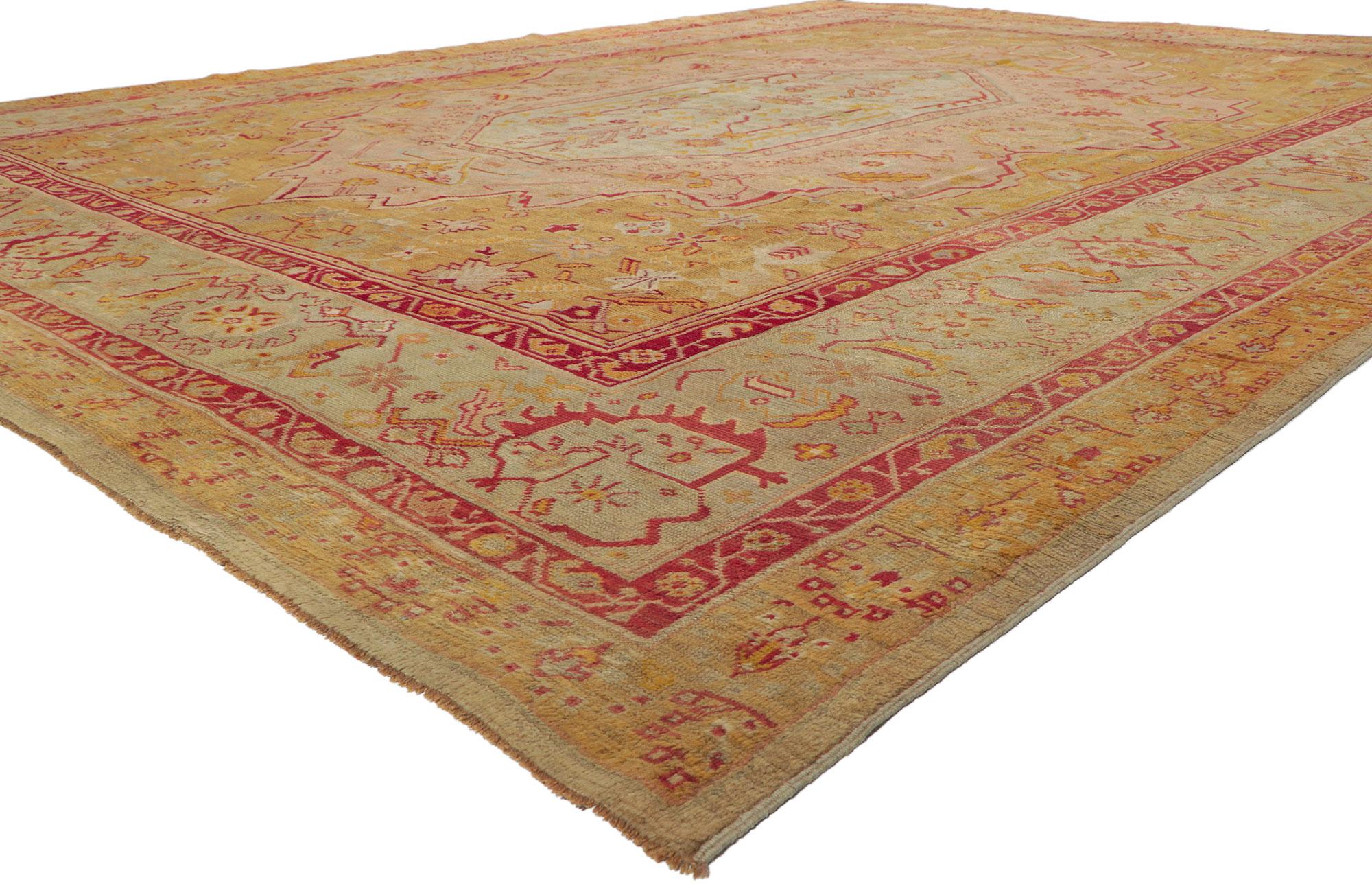 76888 Antique Turkish Oushak Rug, 12'07 x 16'04.
In the seamless fusion of French Provincial elegance and Cosmopolitan Chic, behold the allure of this meticulously hand-knotted antique Turkish Oushak rug. Echoing the artisanal craftsmanship and