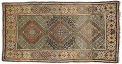 Antique Turkish Oushak Rug in a Classic Amulet Design