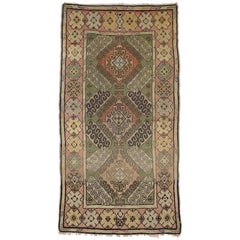 Used Turkish Oushak Rug in a Classic Amulet Design