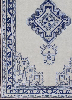 Vintage Turkish Oushak Rug Featuring Deep Indigo and Ivory Geometric Medallion