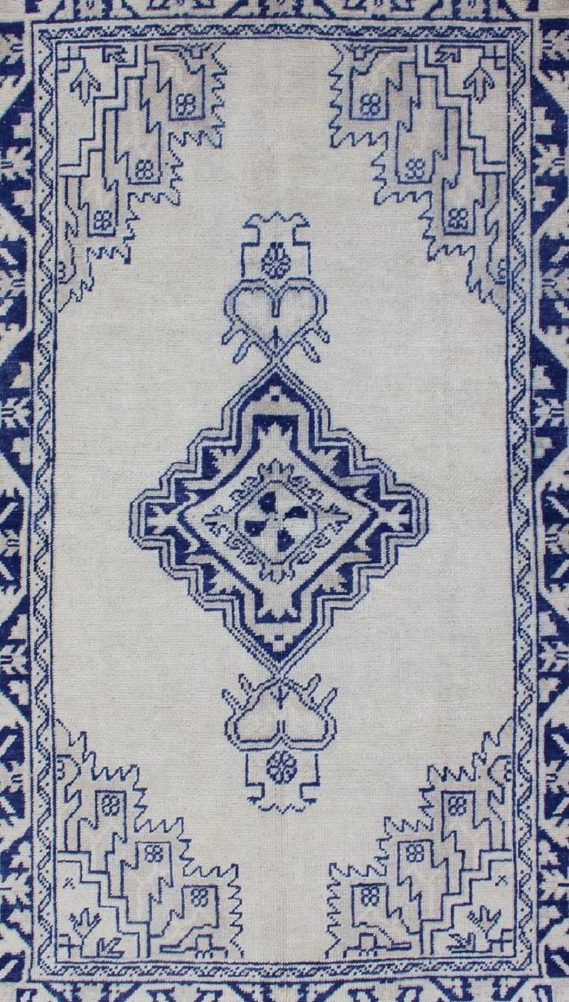 Hand-Knotted Antique Turkish Oushak Rug in Blue and Cream with Central Medallion For Sale