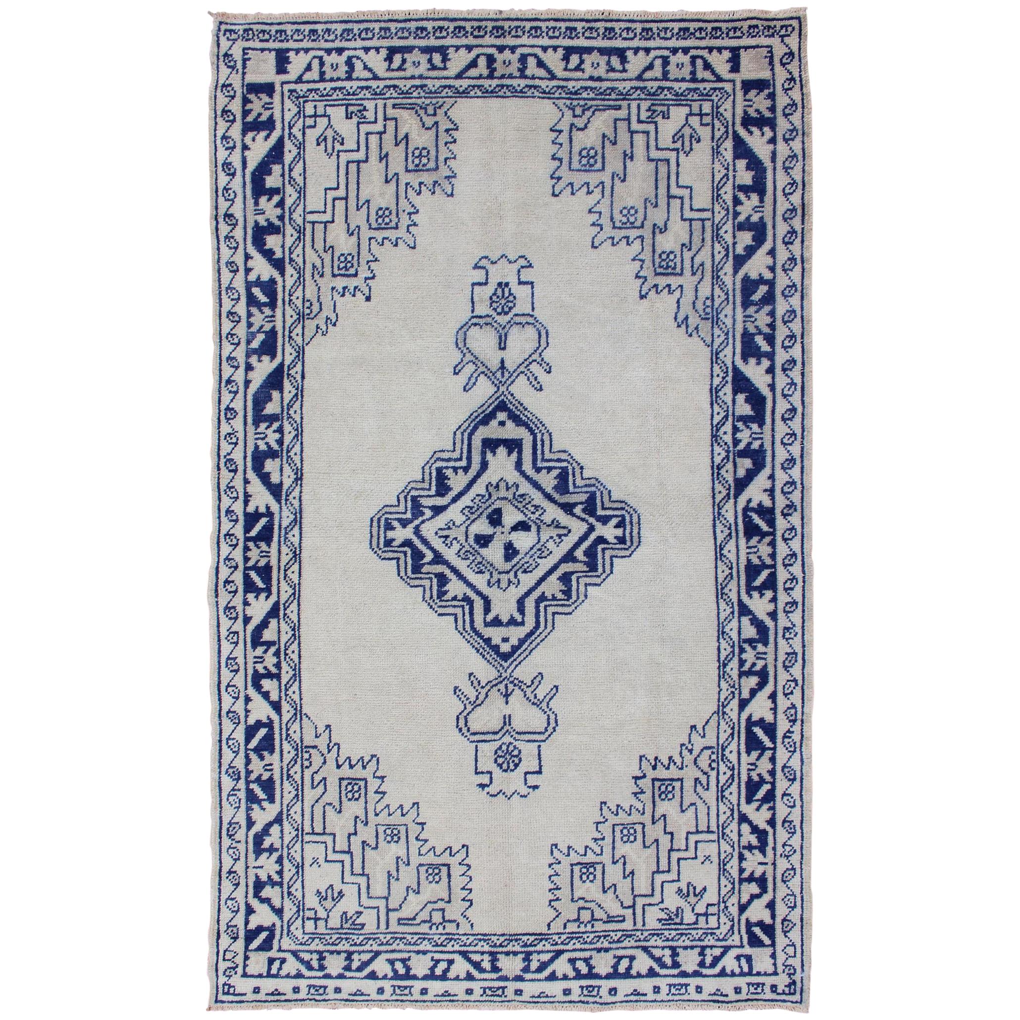 Antique Turkish Oushak Rug in Blue and Cream with Central Medallion