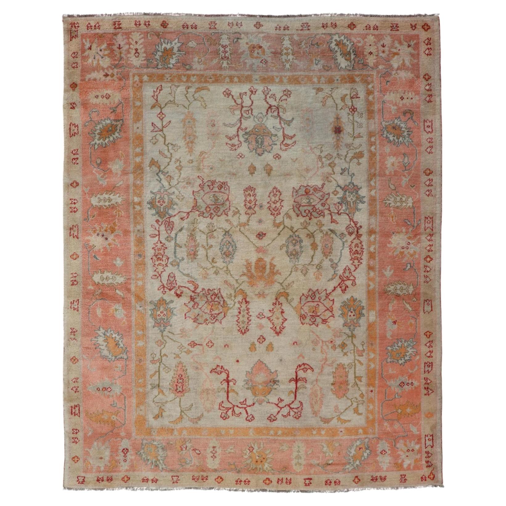 Antique Turkish Oushak Rug in Coral, Ivory and Soft Blue Accents