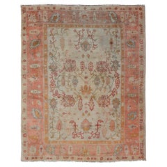 Antique Turkish Oushak Rug in Coral, Ivory and Soft Blue Accents