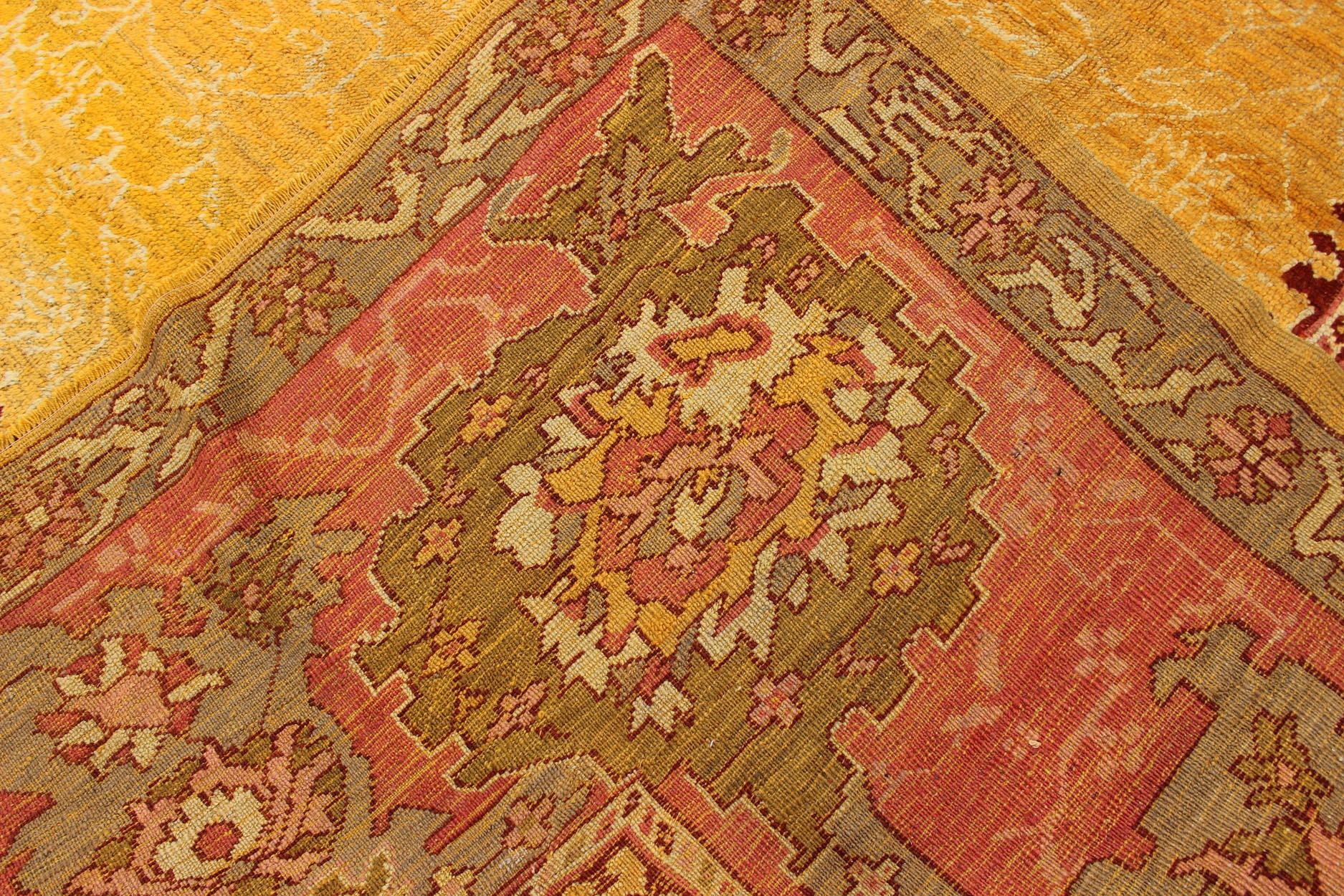 Antique Turkish Oushak rug in gold background, Rose Border & Green  For Sale 4