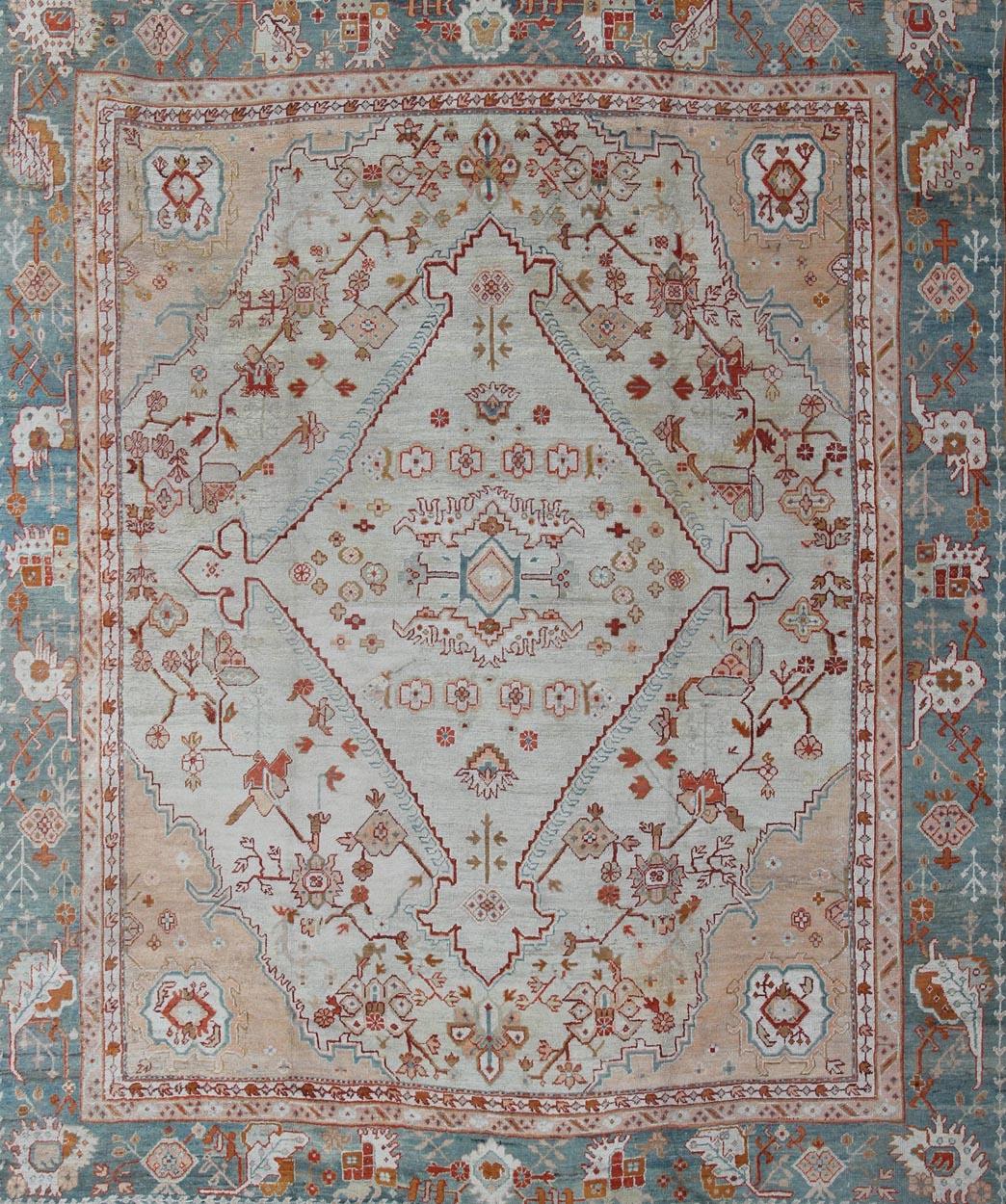20th Century Antique Turkish Oushak Rug in Ice Blue, Taupe Background and Teal Border For Sale