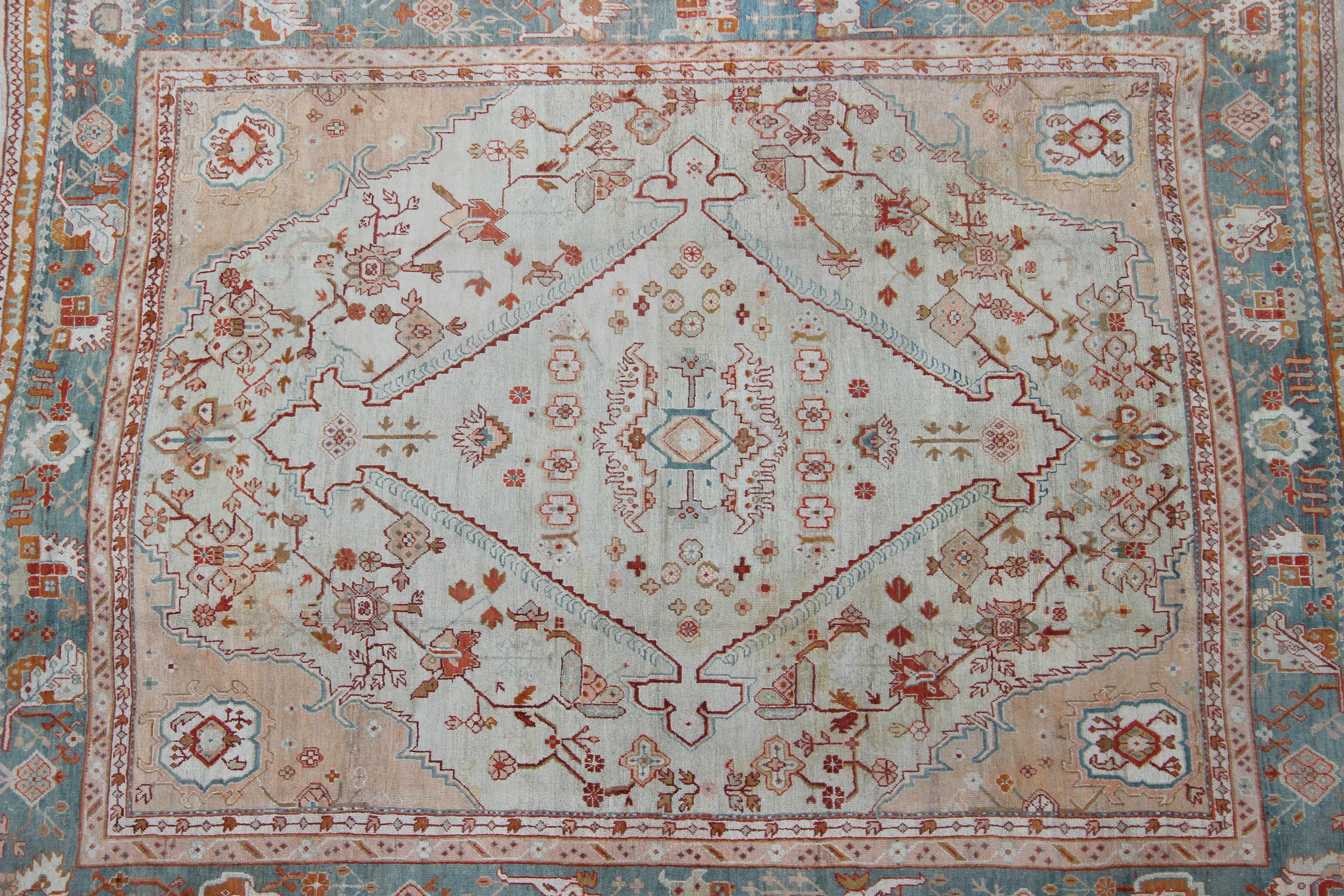 Wool Antique Turkish Oushak Rug in Ice Blue, Taupe Background and Teal Border For Sale