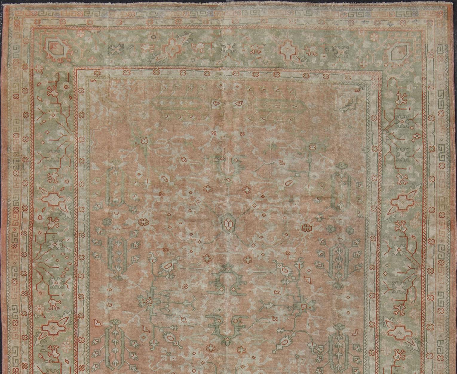 Classic All Over Design Antique Oushak Rug in Light Coral and Light Gray Green, Keivan Woven Arts / rug /EN-142045, country of origin / type: Turkey / Oushak, circa Early-20th century , Classic Oushak Decorative Rug.

Measures: 8'0 x 10'9.

This