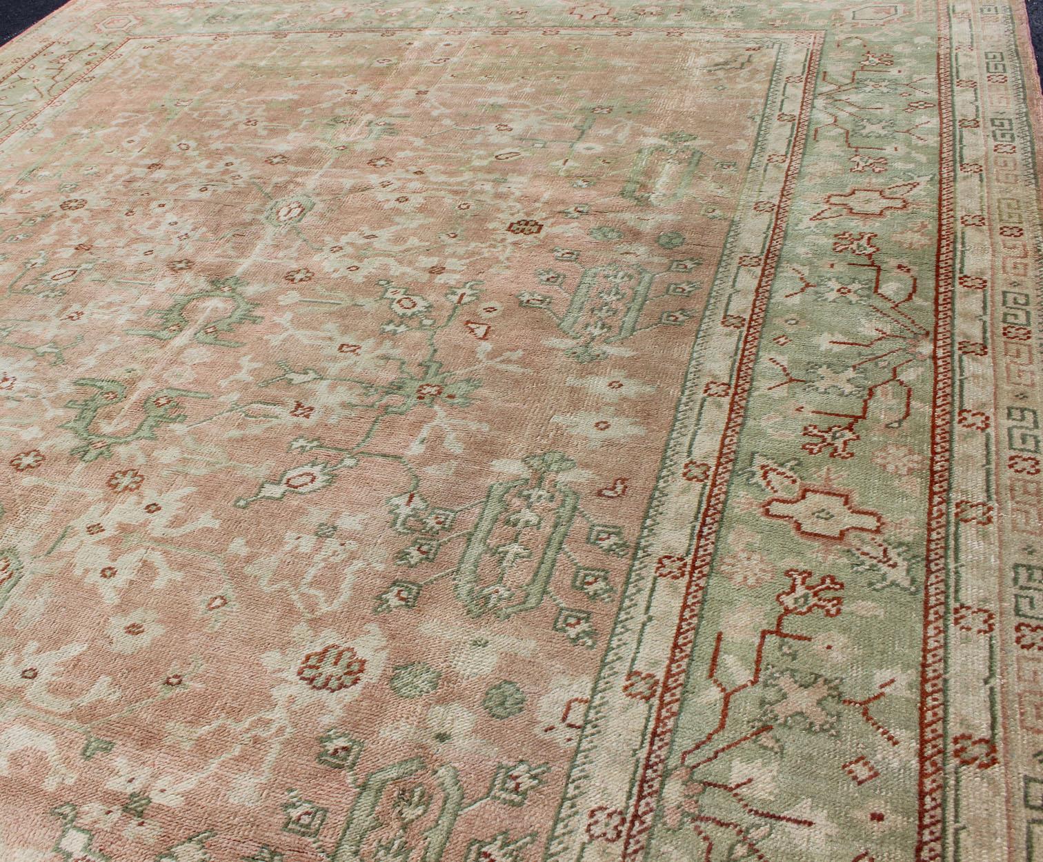 Classic All Over Design Antique Oushak Rug in Light Coral and Light Green For Sale 1
