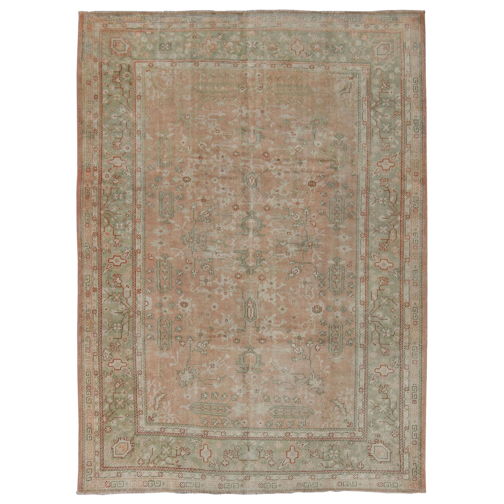 Classic All Over Design Antique Oushak Rug in Light Coral and Light Green For Sale