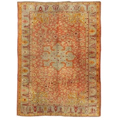 Antique Turkish Oushak Rug in Salmon, Light Green, Red and Butter Yellow