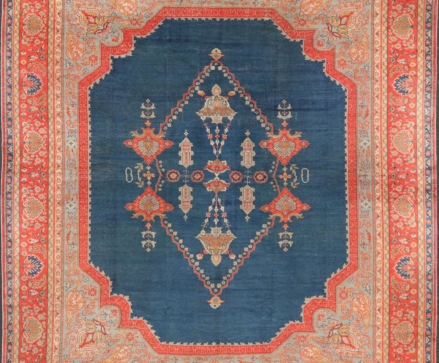 Hand-Knotted Large Antique Turkish Oushak Rug in Blue and Red with Ornate Medallion Design For Sale