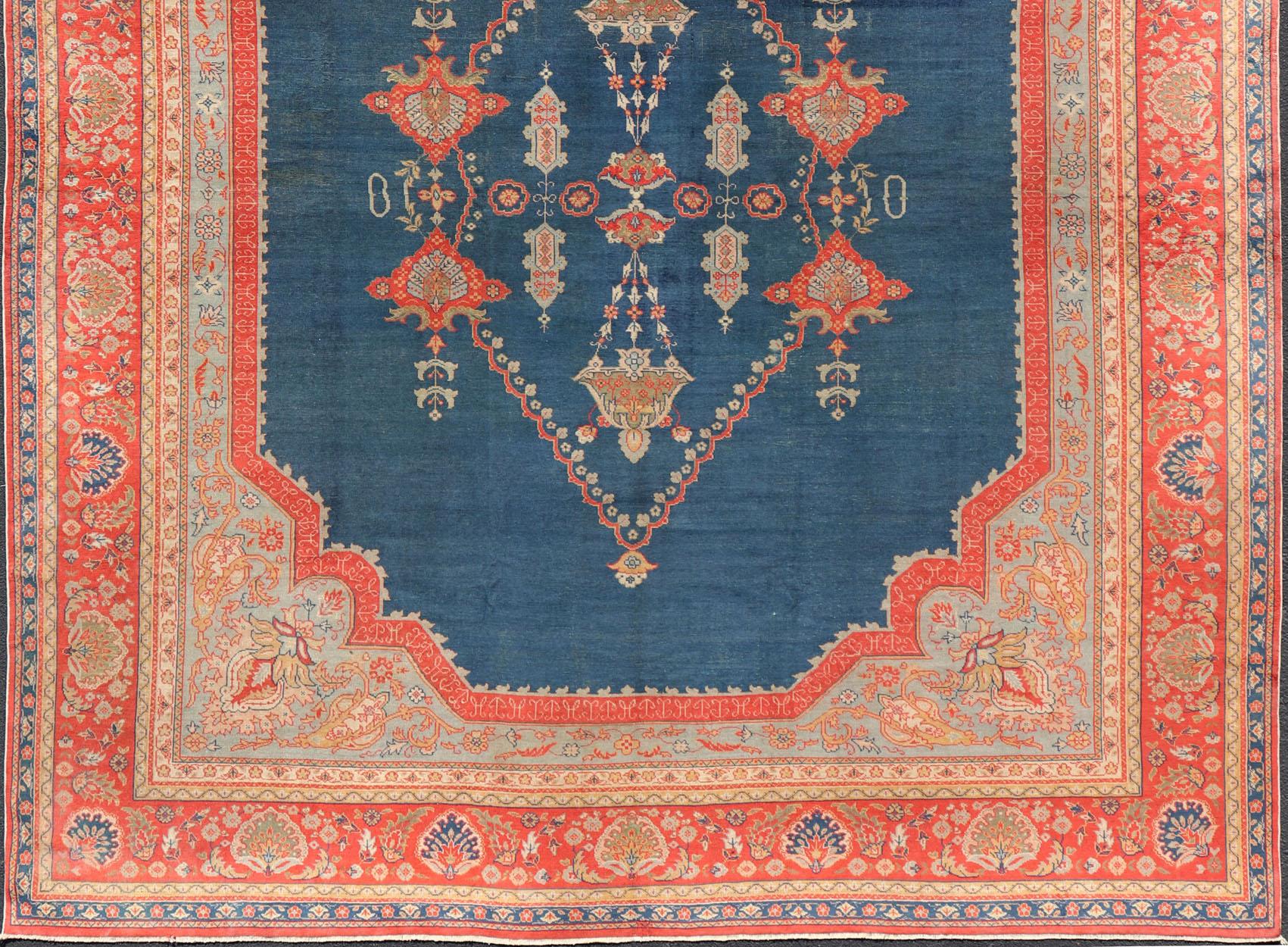 Large Antique Turkish Oushak Rug in Blue and Red with Ornate Medallion Design In Good Condition For Sale In Atlanta, GA