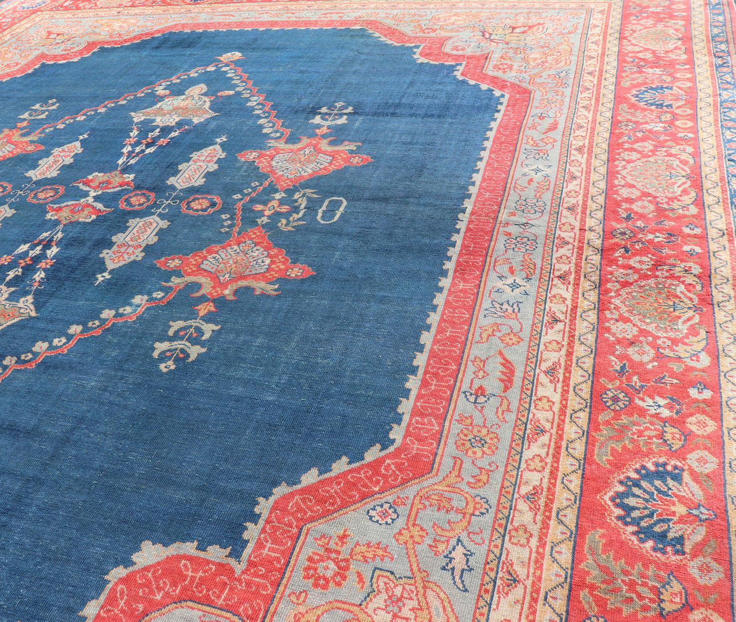 Large Antique Turkish Oushak Rug in Blue and Red with Ornate Medallion Design For Sale 1